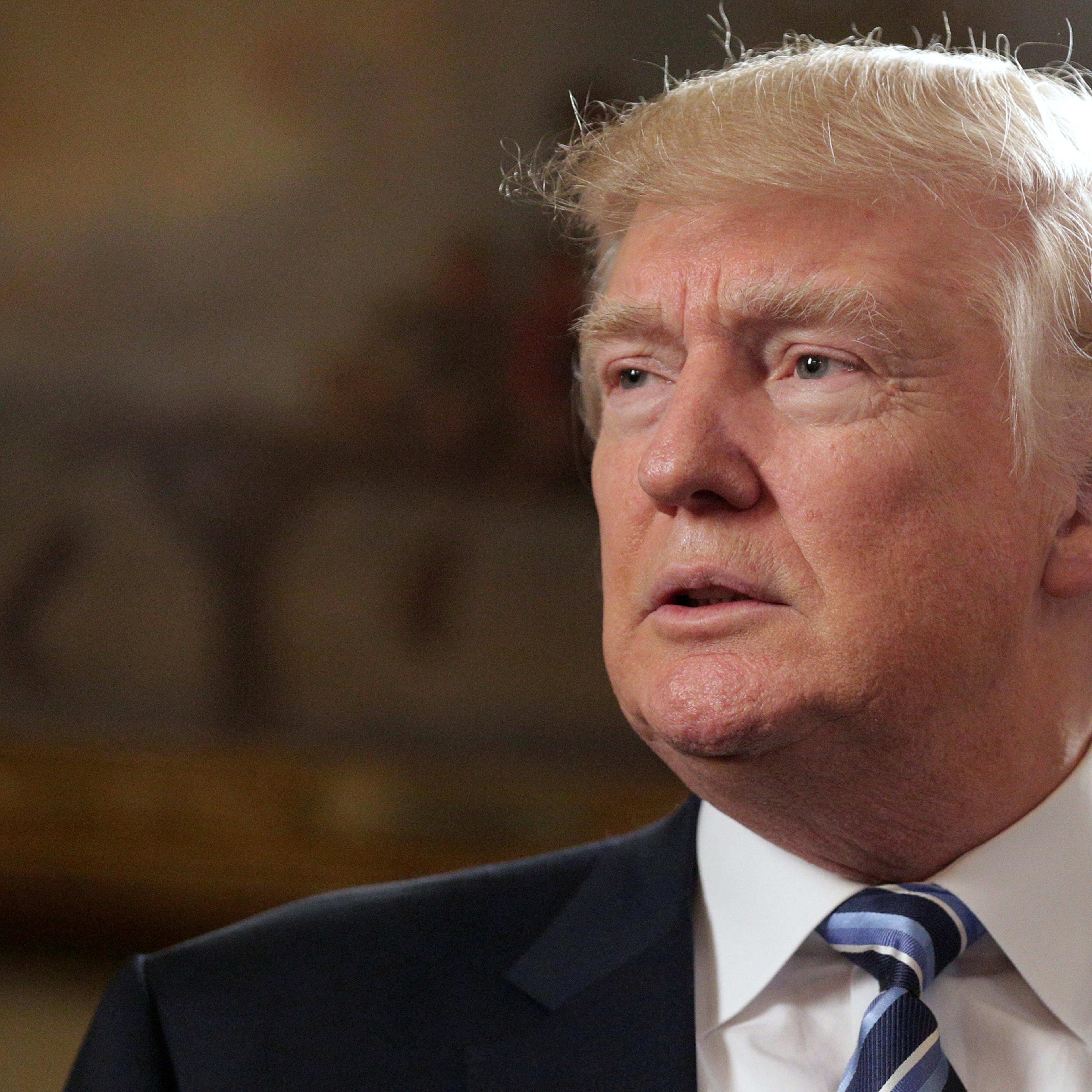 U.S. President Donald Trump speaks during the Inaugural Law Enforcement Officers and First Responders Reception in the Blue Room of the White House in Washington.