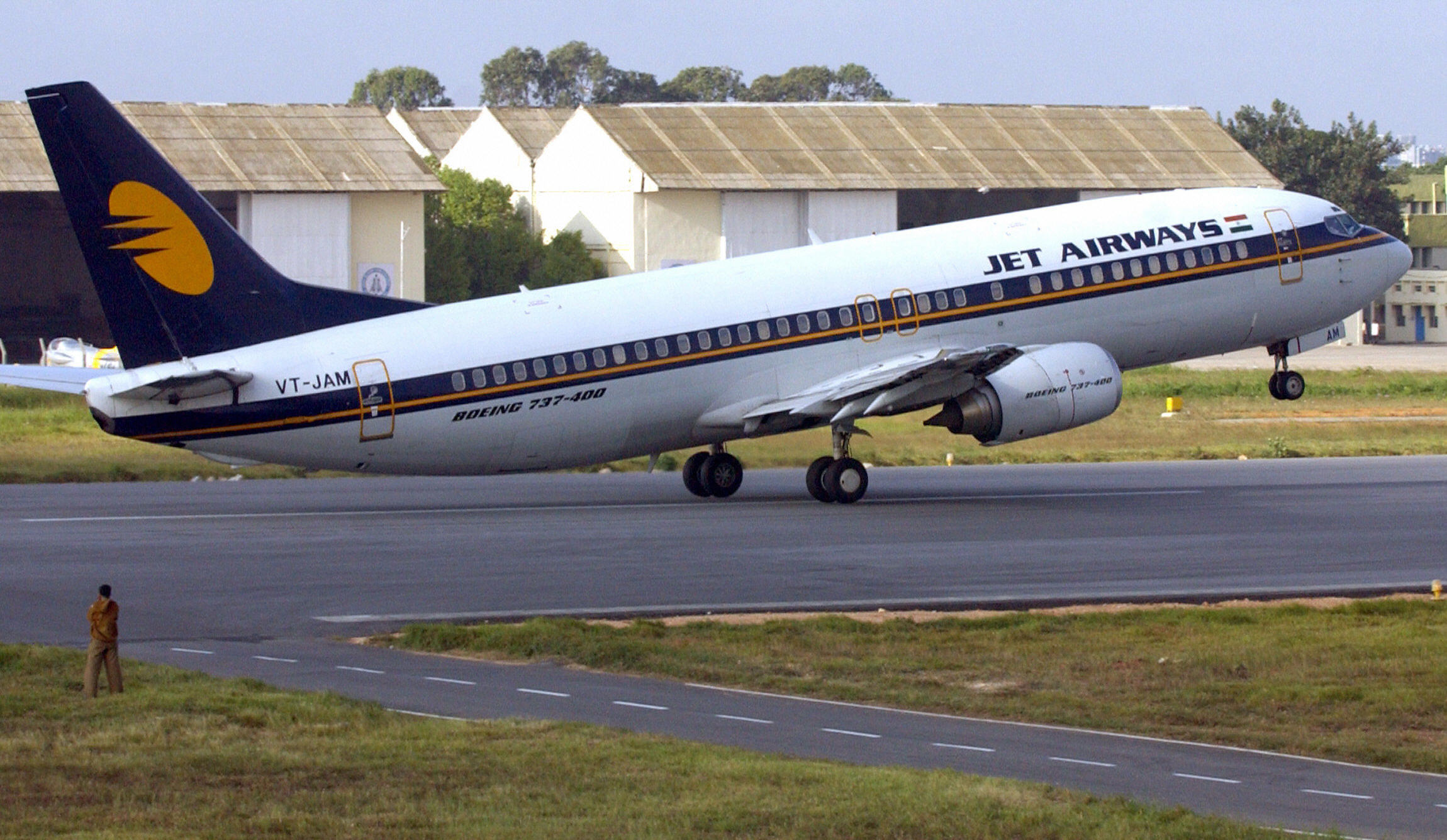 A Boeing 737-400 aircraft from the Jet Airways fleet takes off in Bangalore. 