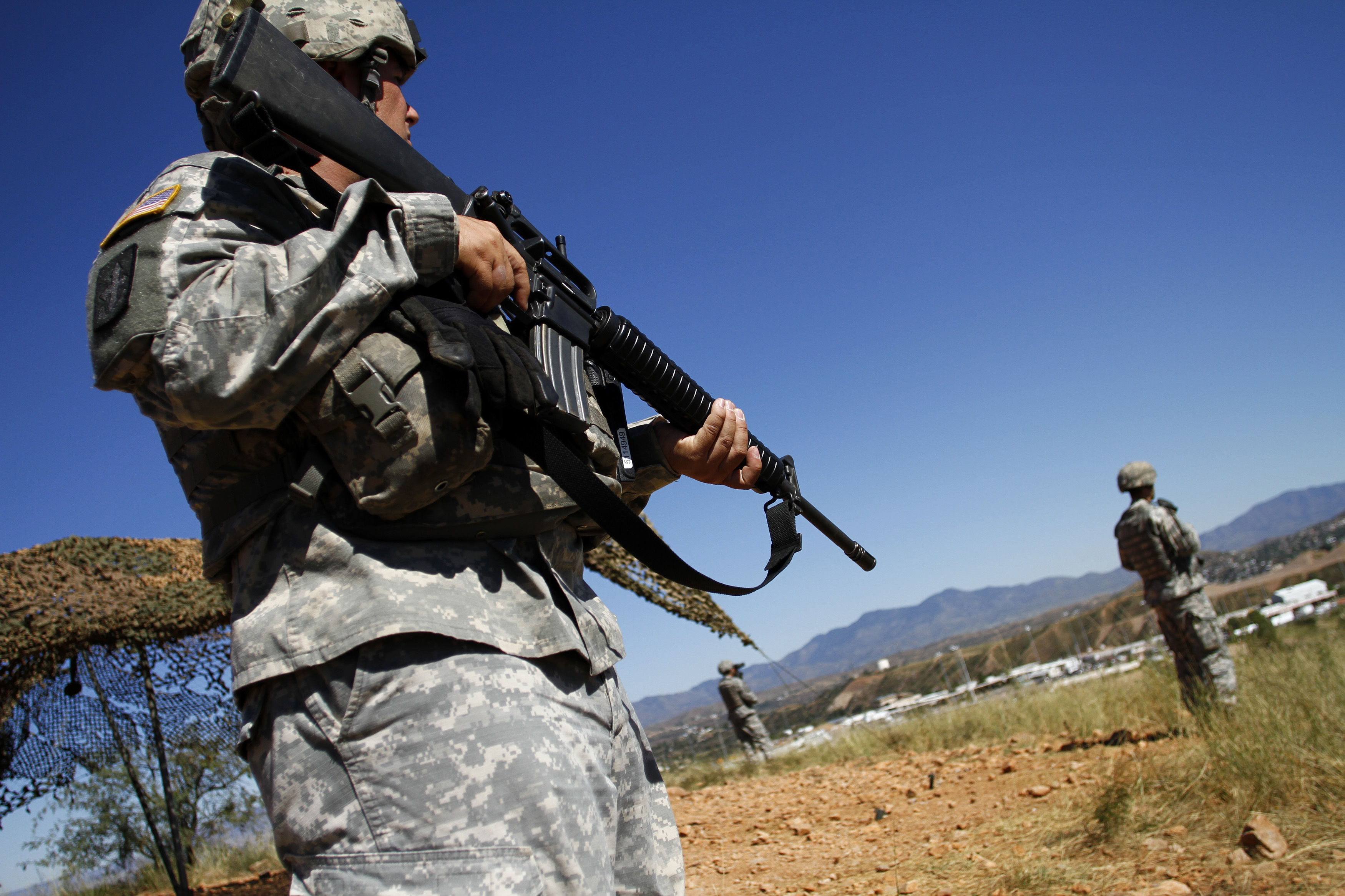United States National Guard troops patrol along the U.S. and Mexico border in Nogales