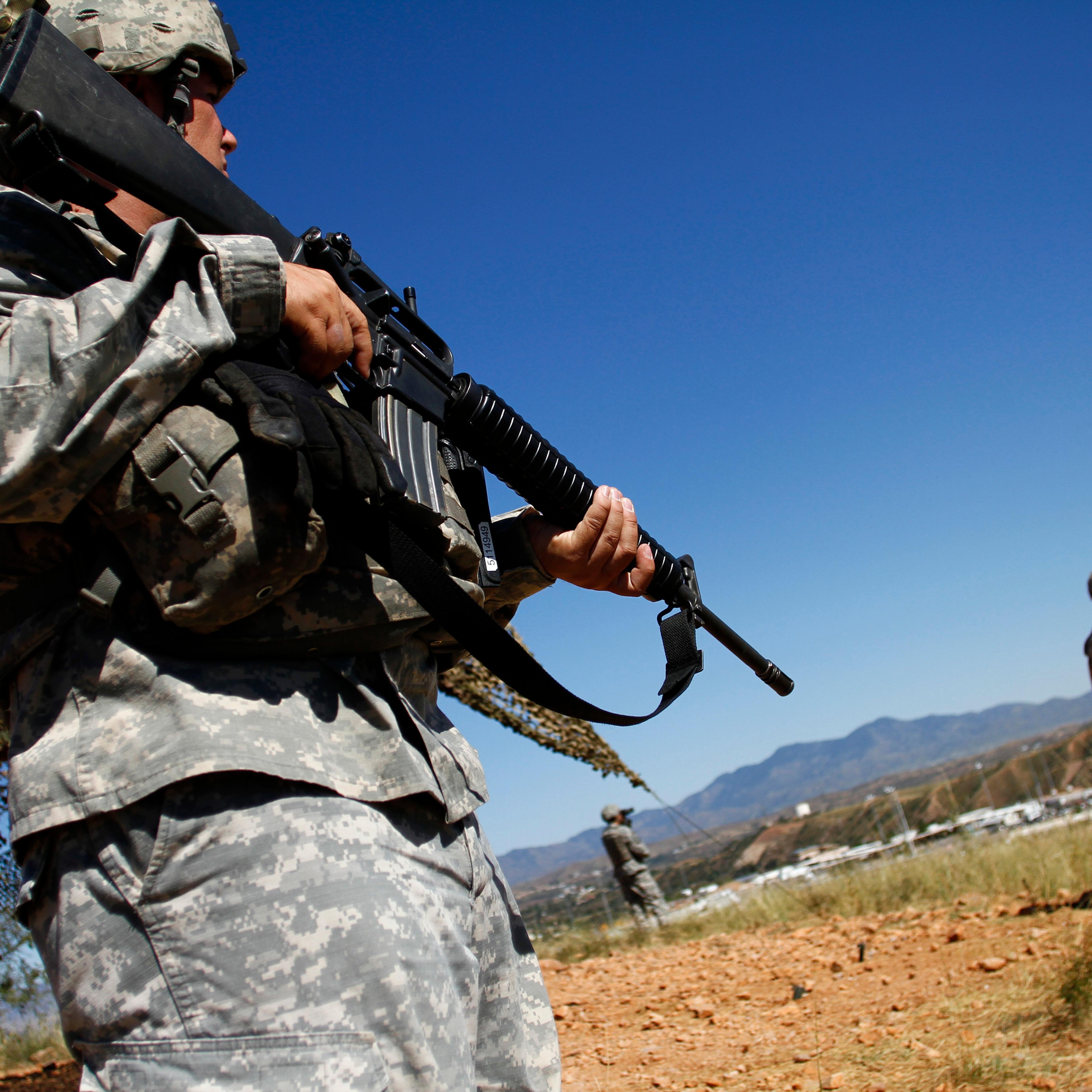 United States National Guard troops patrol along the U.S. and Mexico border in Nogales