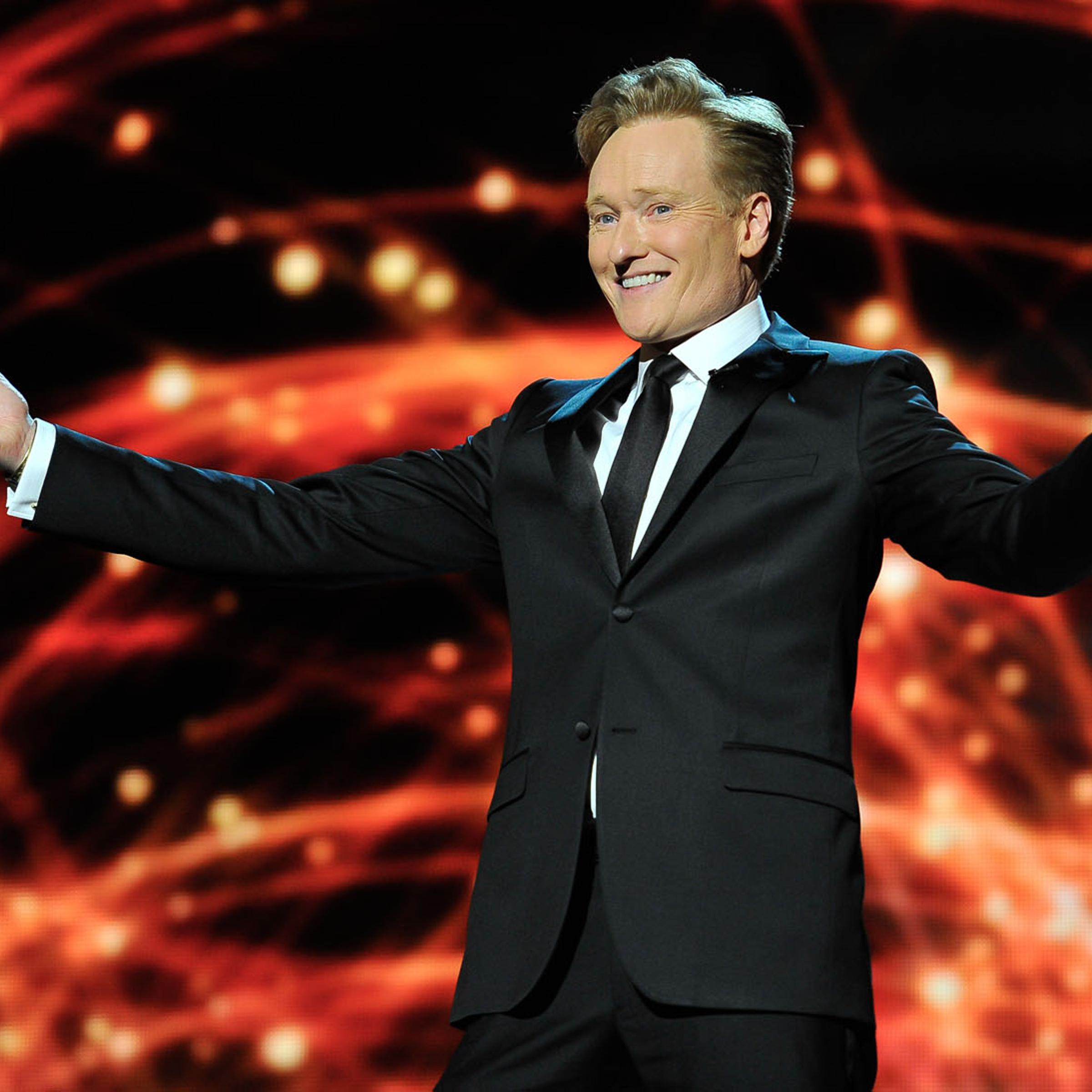 Conan O'Brien presents at the 2014 Breakthrough Prizes Awarded in Fundamental Physics and Life Sciences Ceremony at NASA Ames Research Center on December 12, 2013 in Mountain View, California.