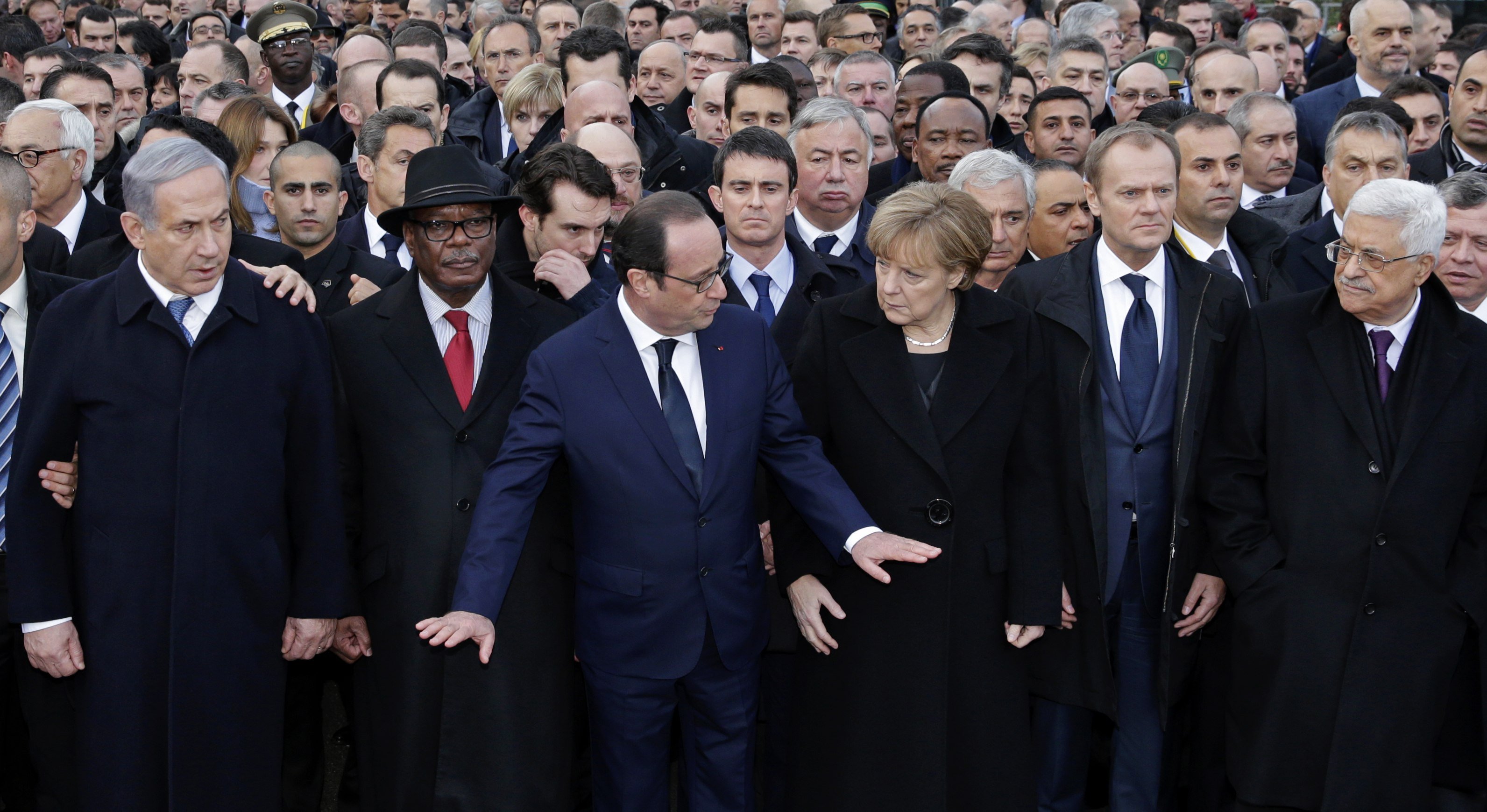 French President Francois Hollande is surrounded by heads of state attends the solidarity march (Marche Republicaine) in the streets of Paris