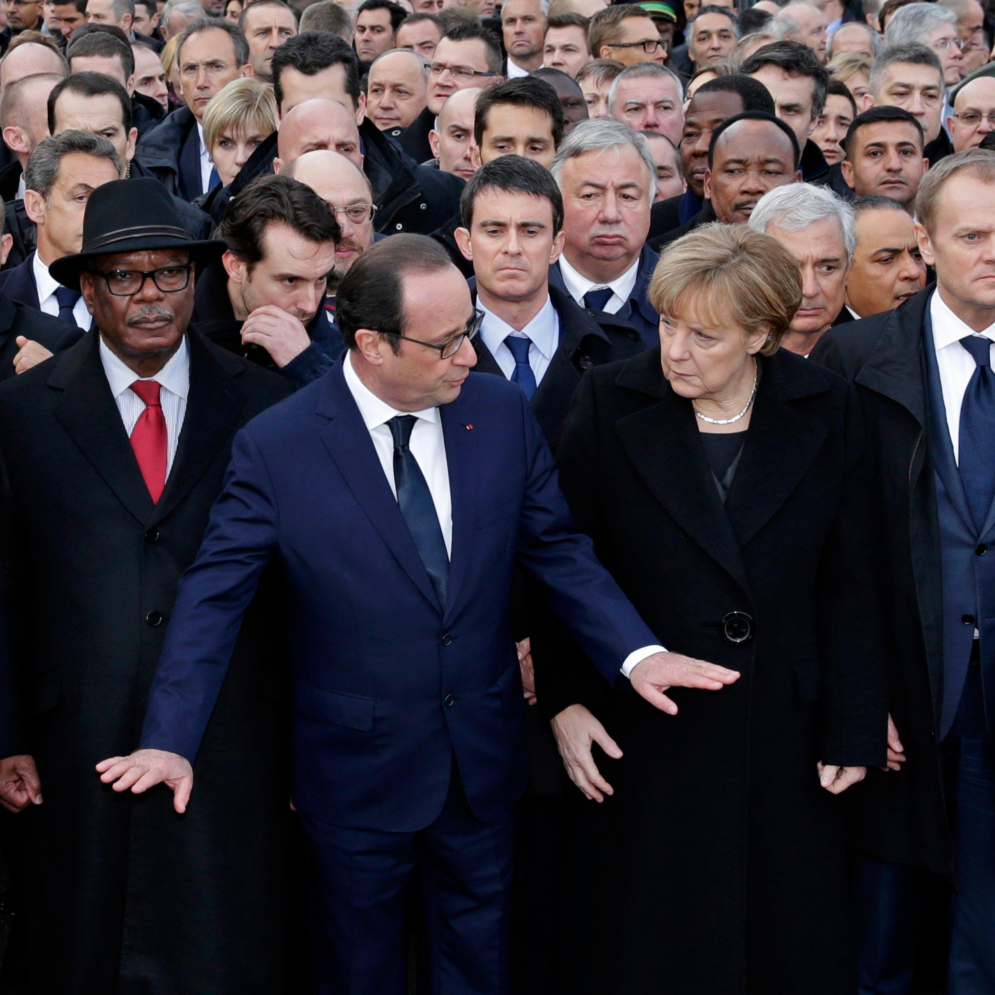 French President Francois Hollande is surrounded by heads of state attends the solidarity march (Marche Republicaine) in the streets of Paris