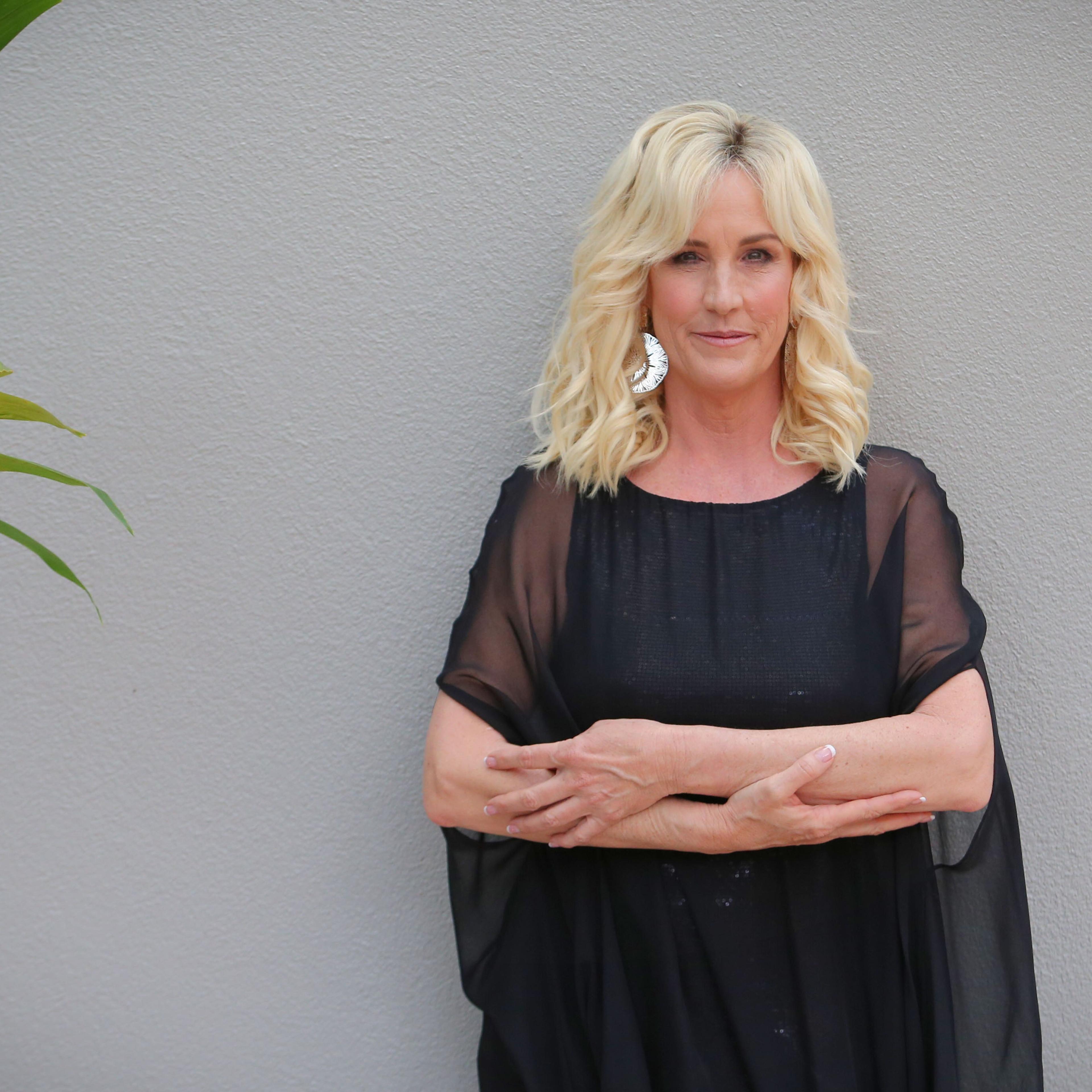 American legal clerk and environmental activist, Erin Brockovich poses during a photo shoot at the Stamford Hotel in Brisbane, Australia, on February 17, 2015.