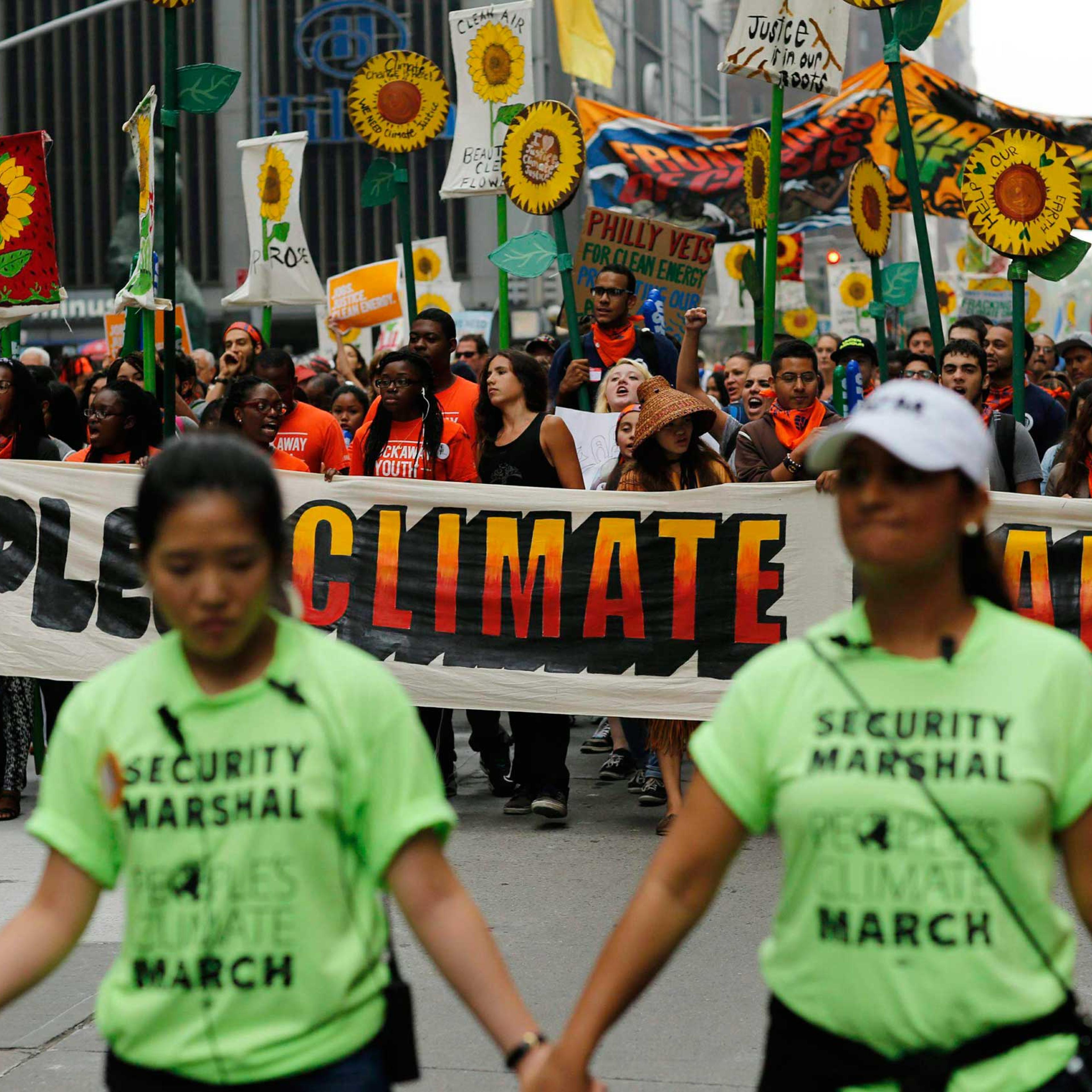 People take part in a march against climate change in New York