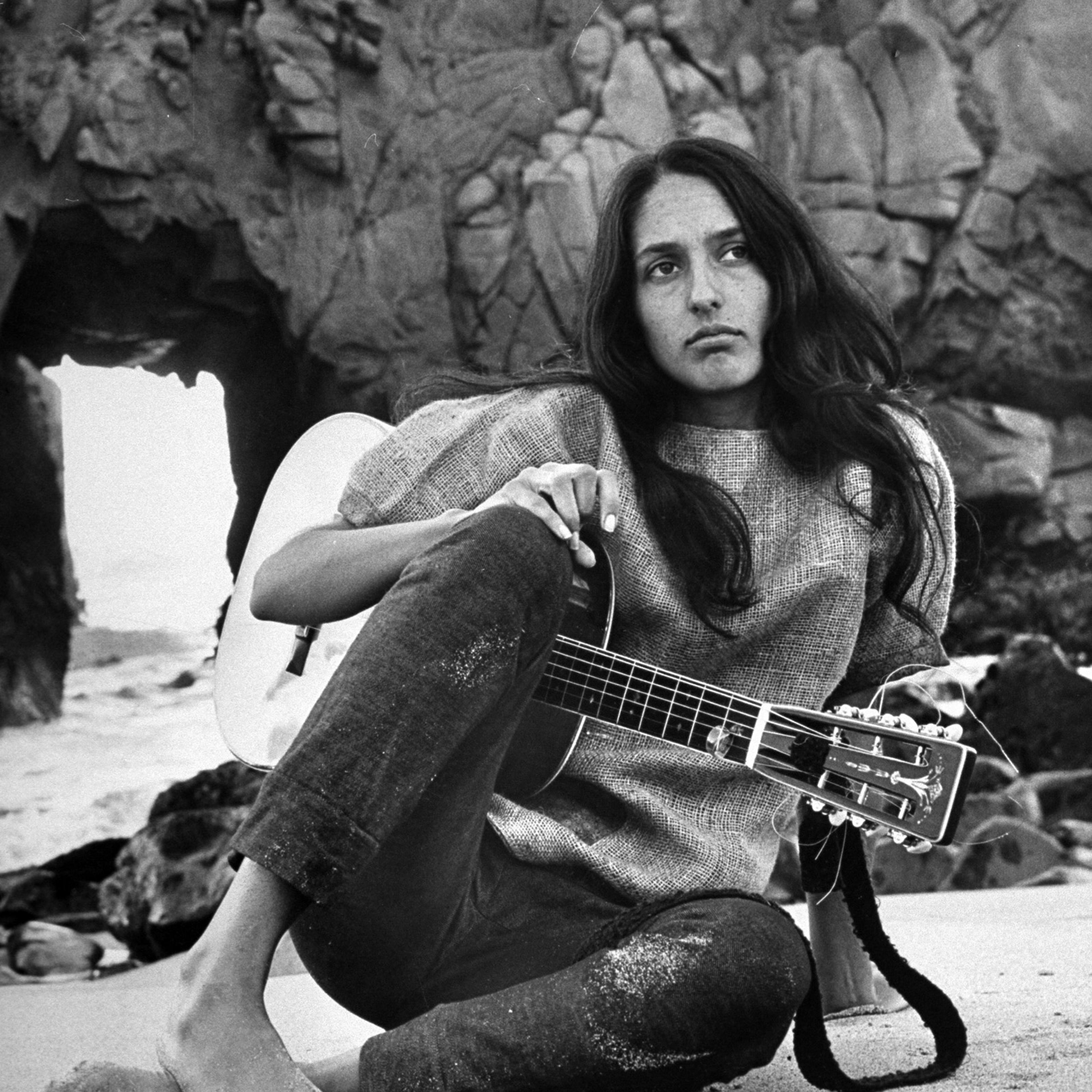 Folk singer Joan Baez on the beach near her home in Carmel, California, in 1962.