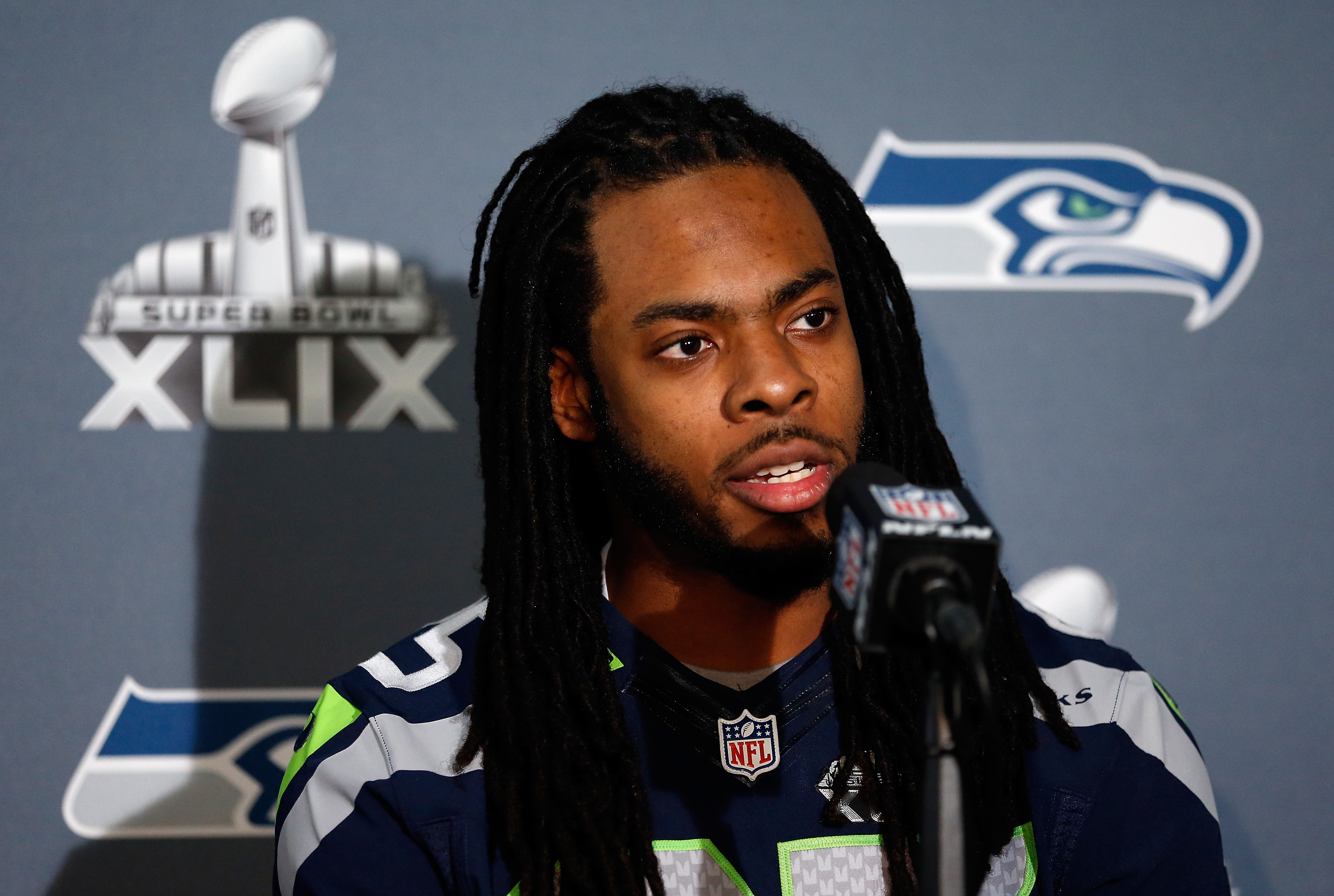 Seattle Seahawks cornerback Richard Sherman speaks during a Super Bowl XLIX media availability in Chandler, Ariz. on Jan. 28, 2015.