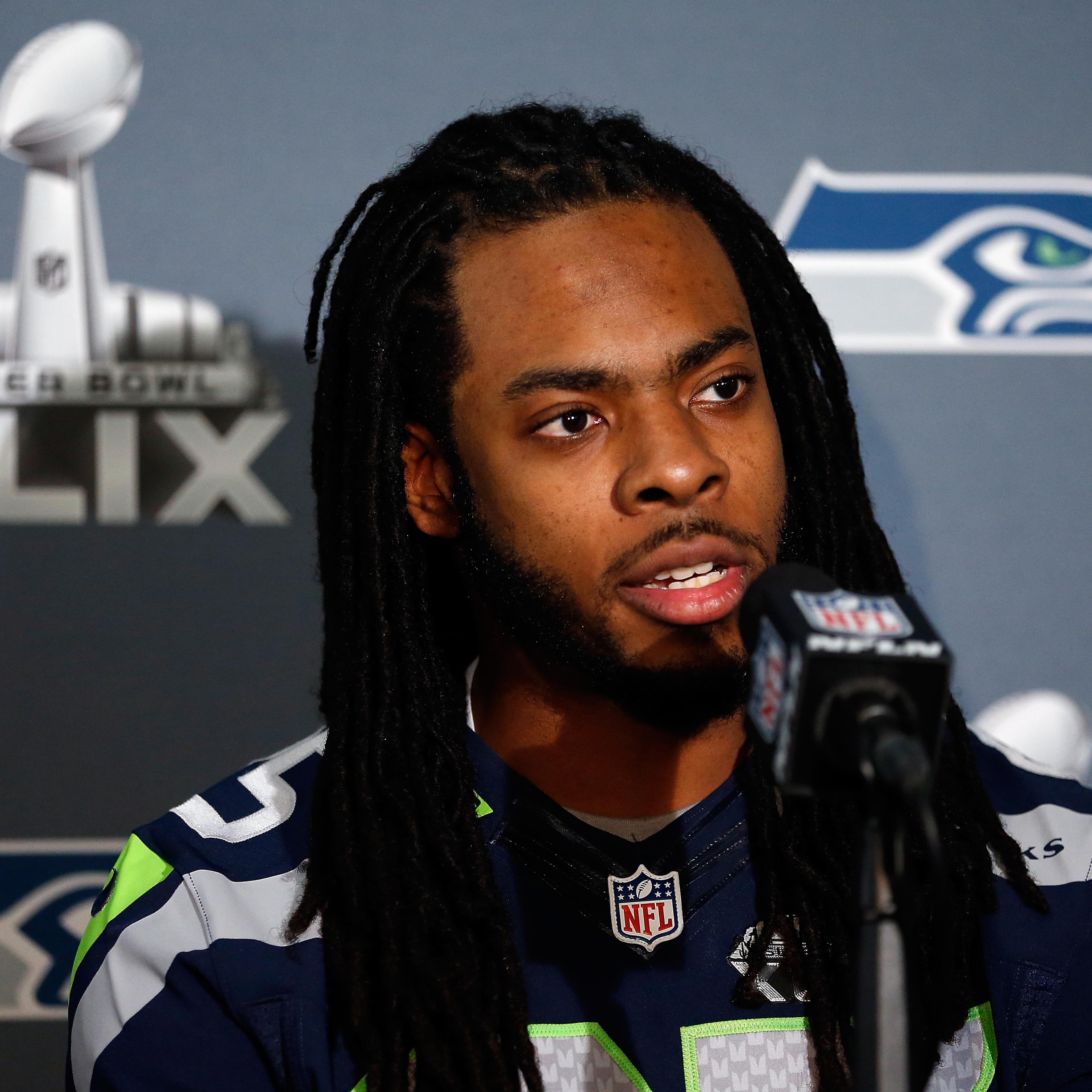 Seattle Seahawks cornerback Richard Sherman speaks during a Super Bowl XLIX media availability in Chandler, Ariz. on Jan. 28, 2015.