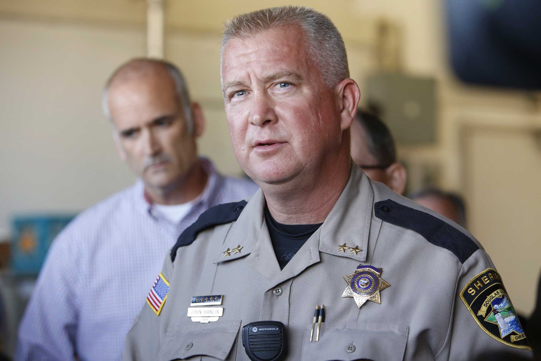 Douglas county sheriff John Hanlin pauses while speaking to media after a mass shooting at Umpqua Community College in Roseburg Oregon