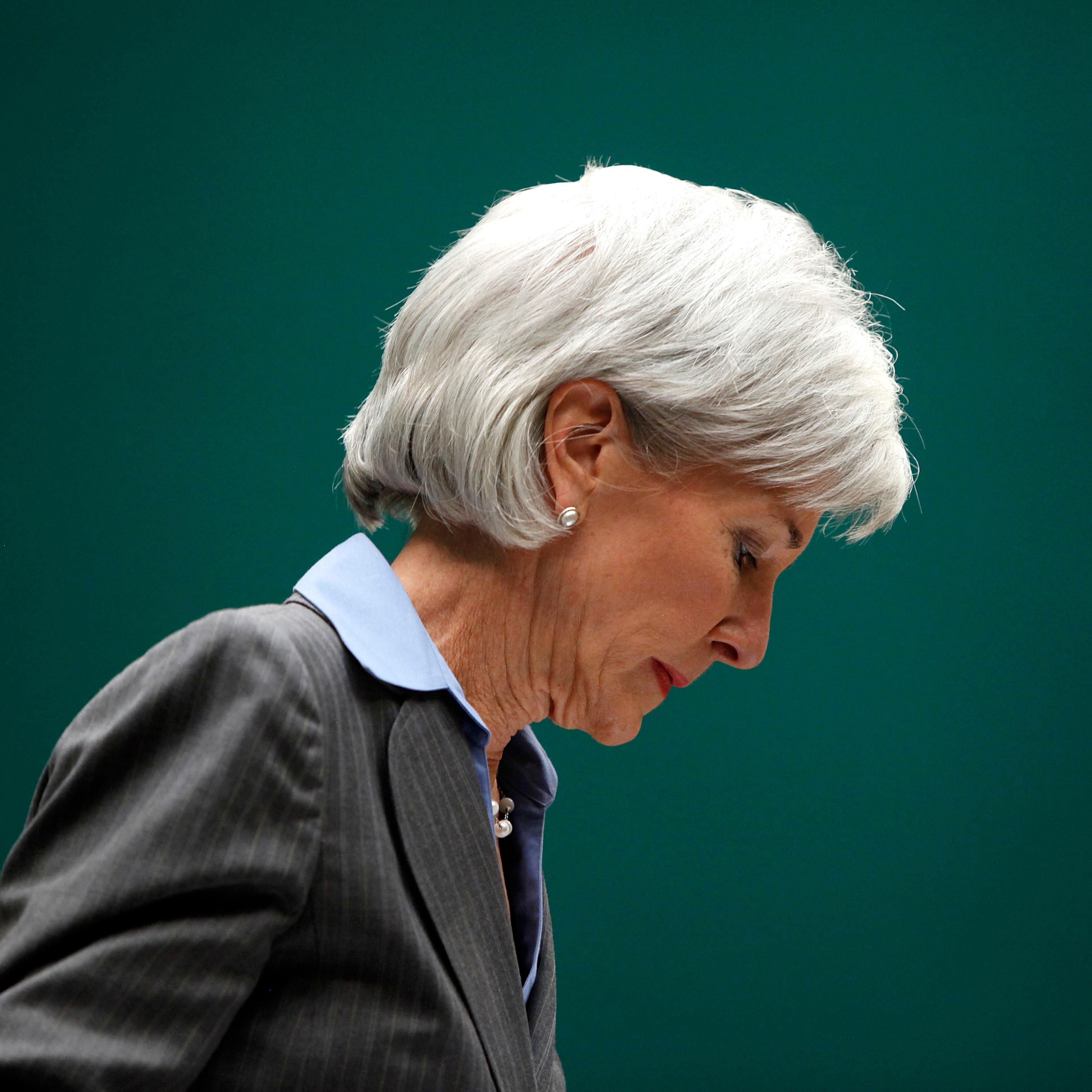 Health and Human Services Secretary Sebelius takes her seat to testify before a House Energy and Commerce Committee hearing about issues and complications with the Affordable Care Act enrollment website, on Capitol Hill