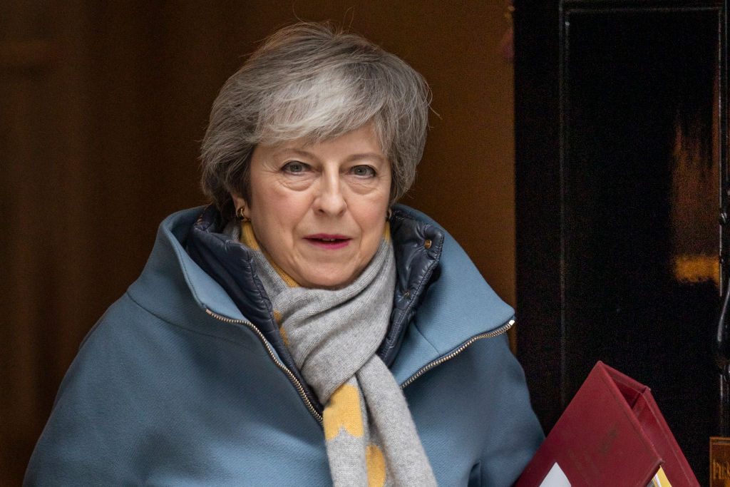 Prime Minister Theresa May leaves 10 Downing Street to attend PMQ's