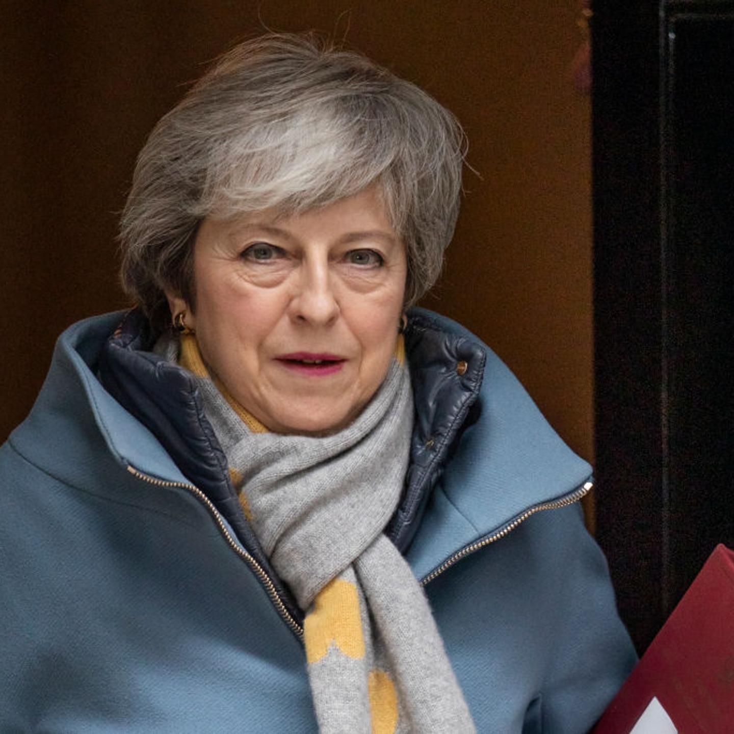 Prime Minister Theresa May leaves 10 Downing Street to attend PMQ's