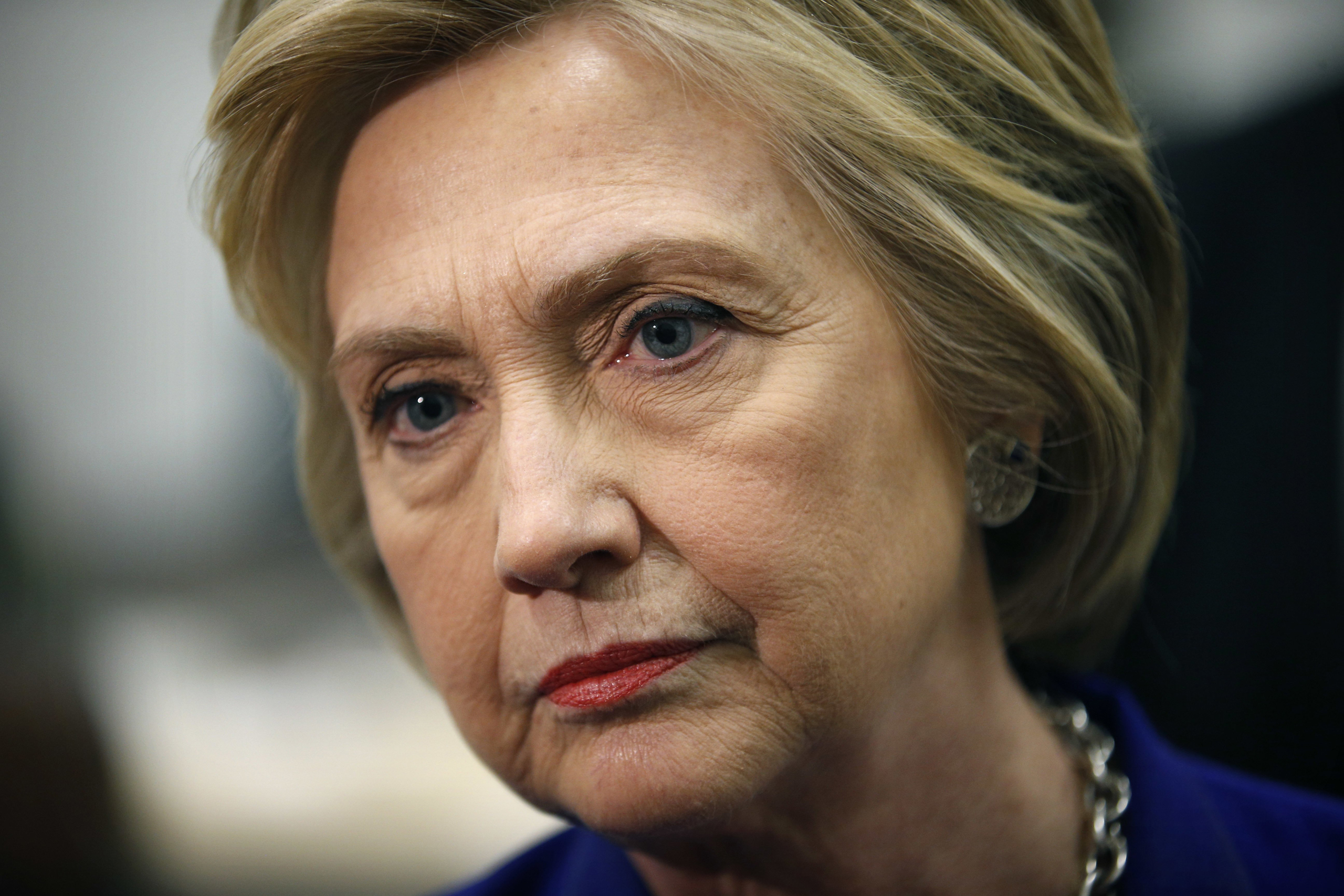 Democratic presidential candidate Hillary Clinton listens while speaking with the media during a visit to a community center in Compton, Calif. on June 6, 2016.