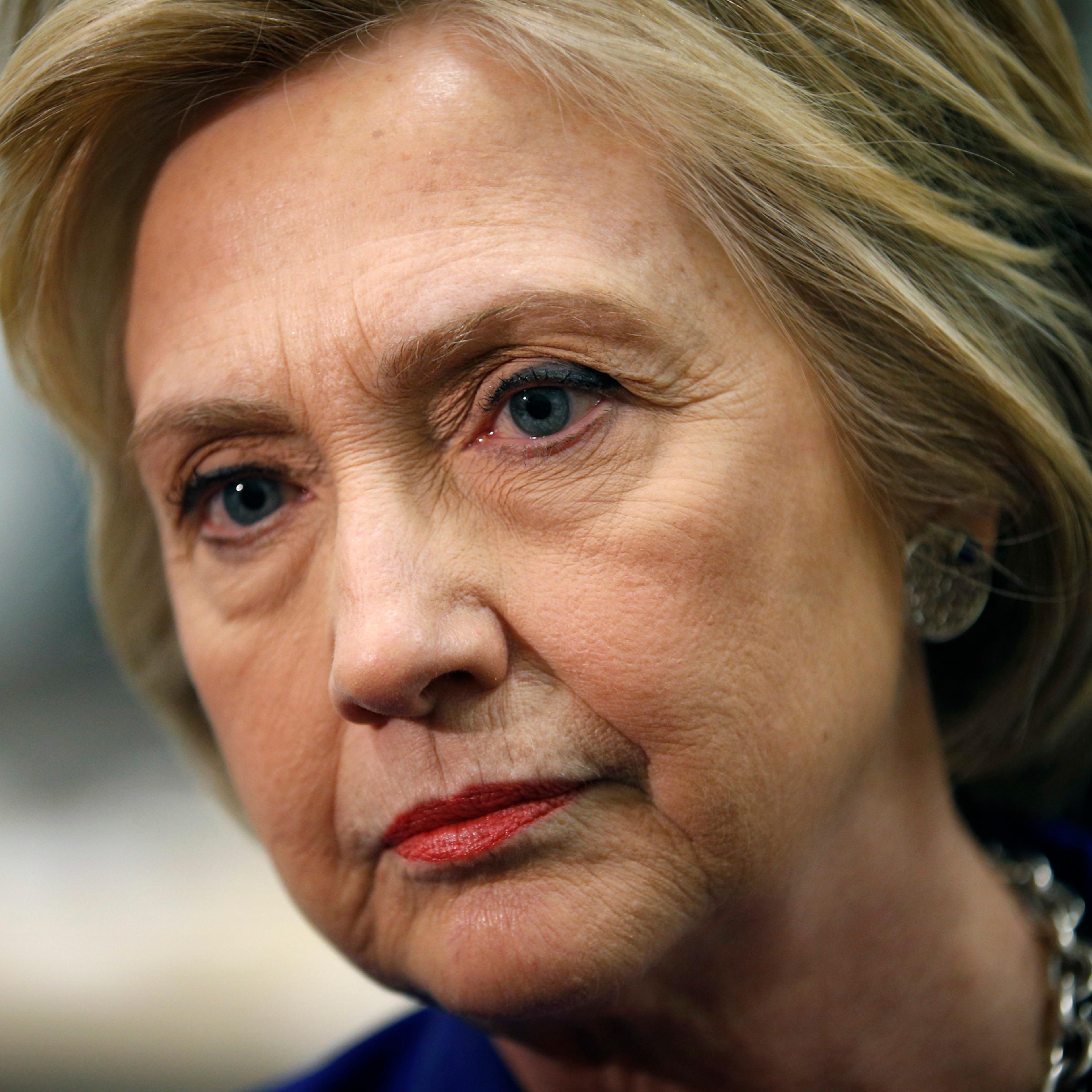 Democratic presidential candidate Hillary Clinton listens while speaking with the media during a visit to a community center in Compton, Calif. on June 6, 2016.