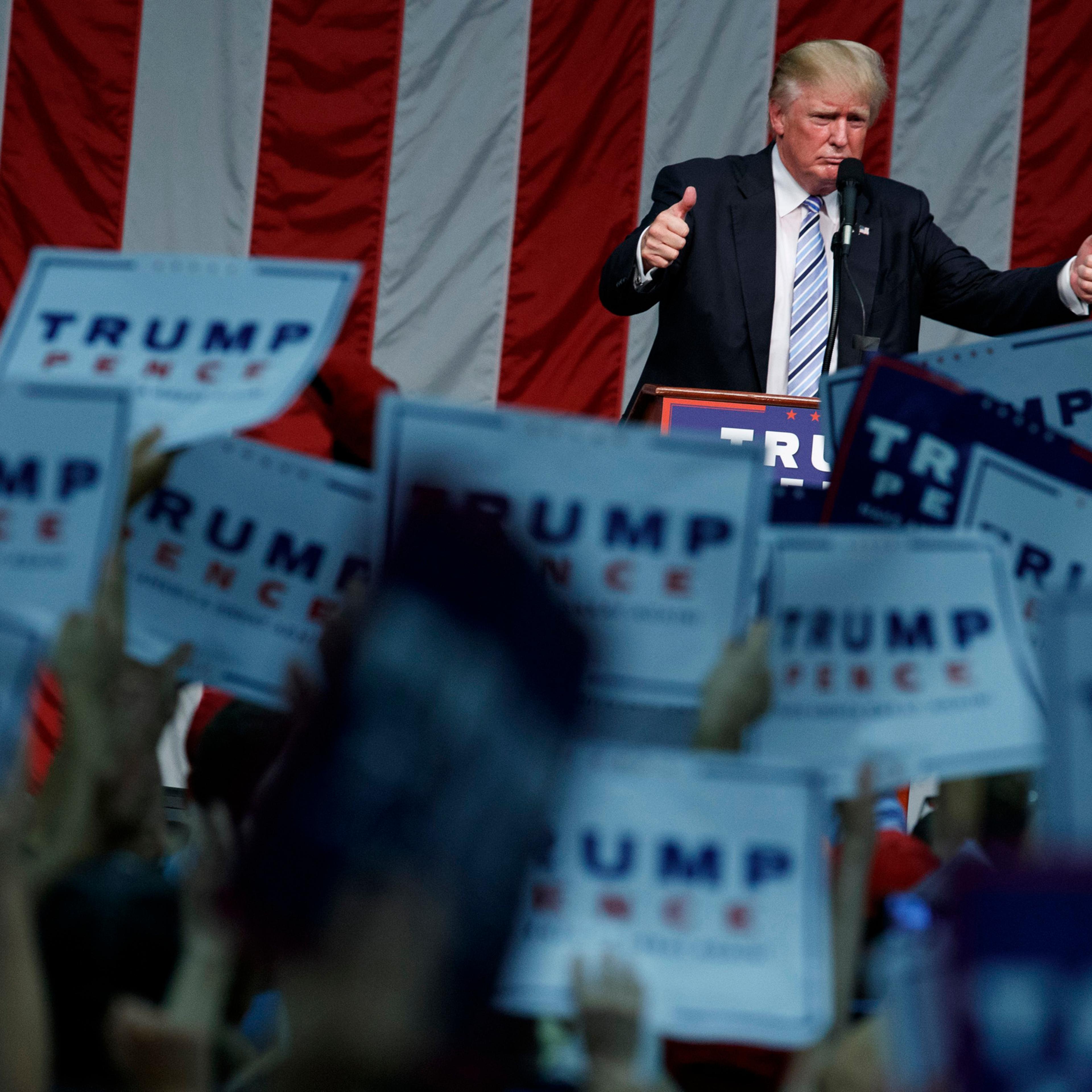 Republican presidential candidate Donald Trump gives a thumbs up after speaking during a campaign rally at Sacred Heart University in Fairfield, Conn. on Aug. 13, 2016.