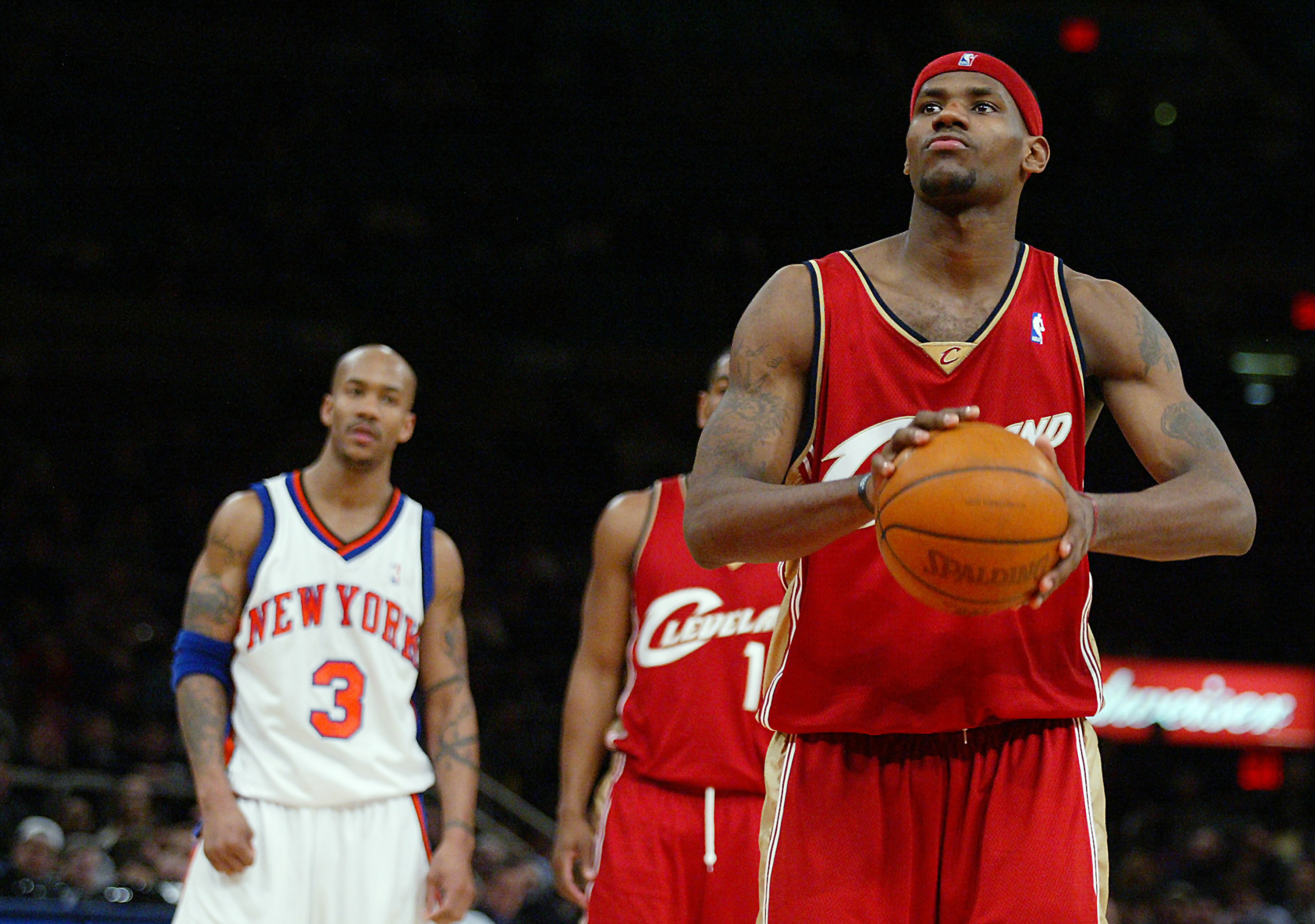 The Cleveland Cavaliers' LeBron James gets set to take a fou