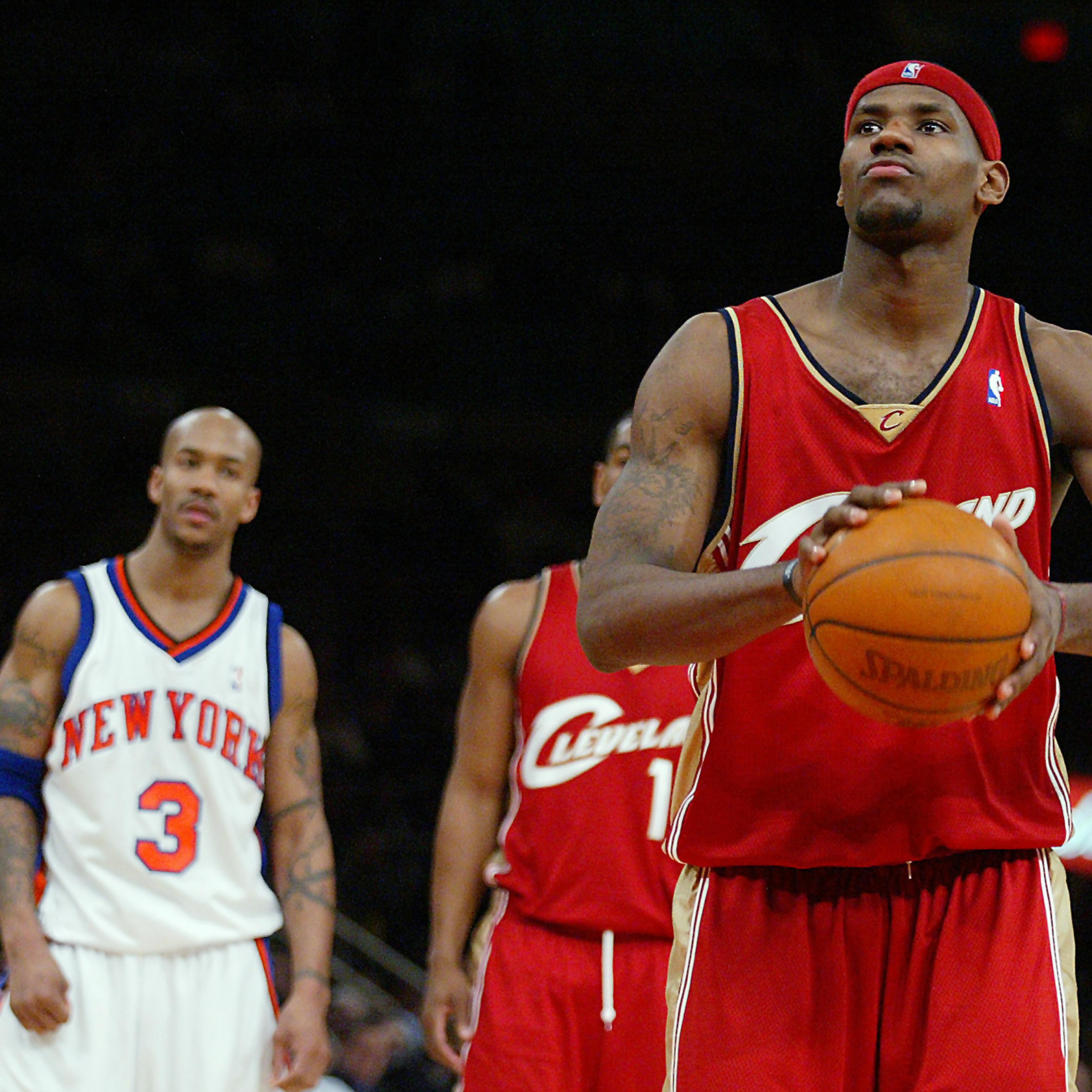 The Cleveland Cavaliers' LeBron James gets set to take a fou
