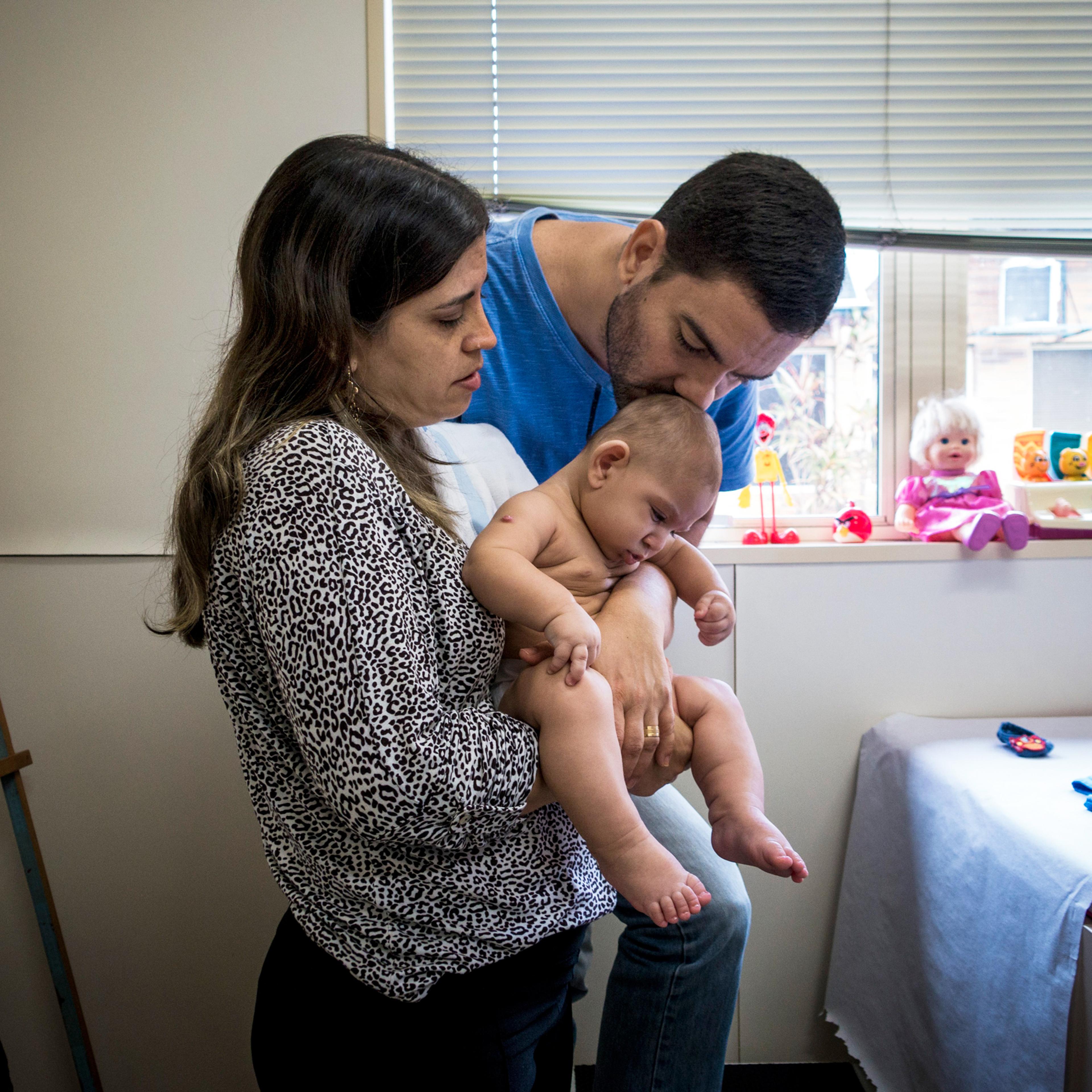Isabelle and Moises Albuquerque with their son at a rehab center in Recife that helps children with microcephaly