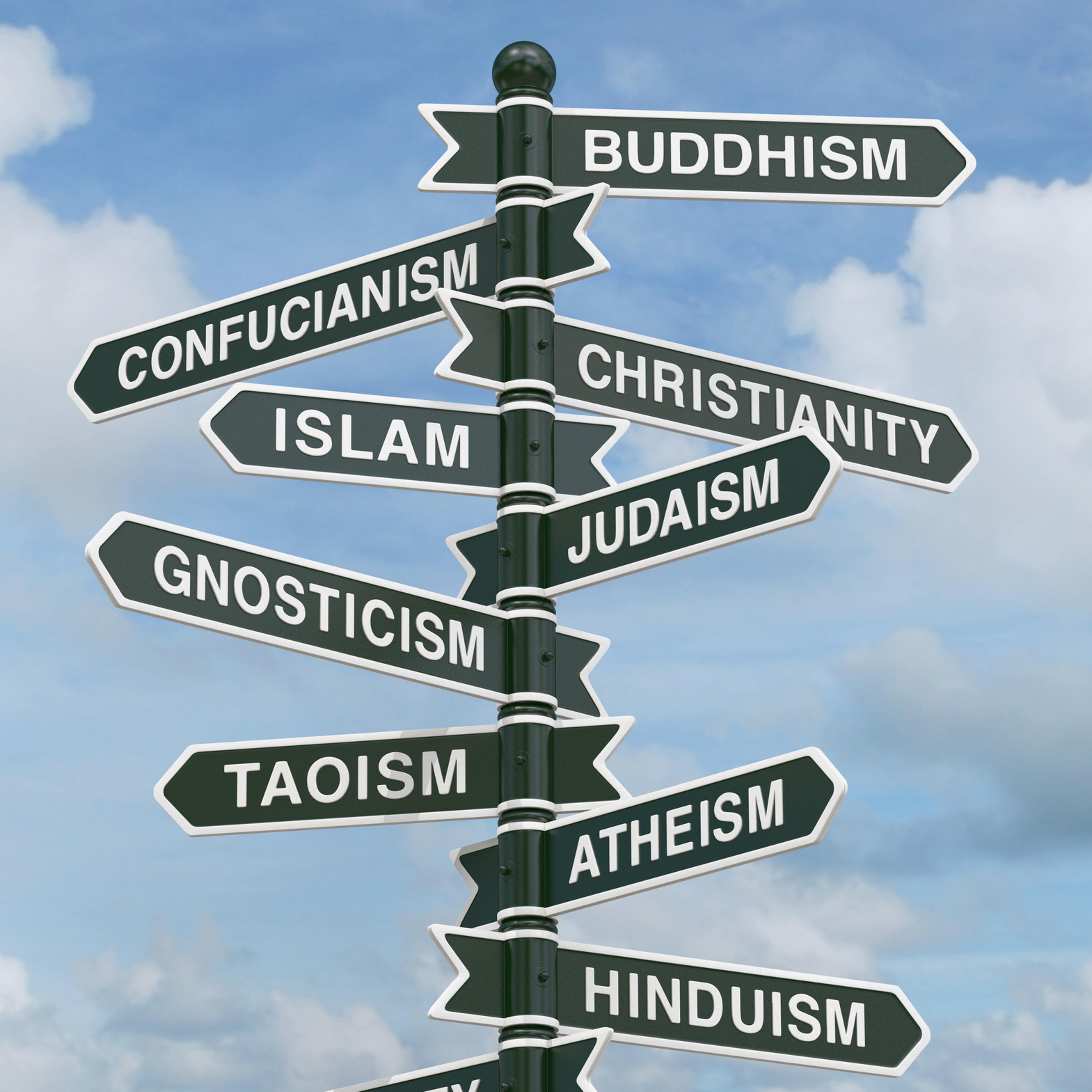 Directional signs pointing to various religions