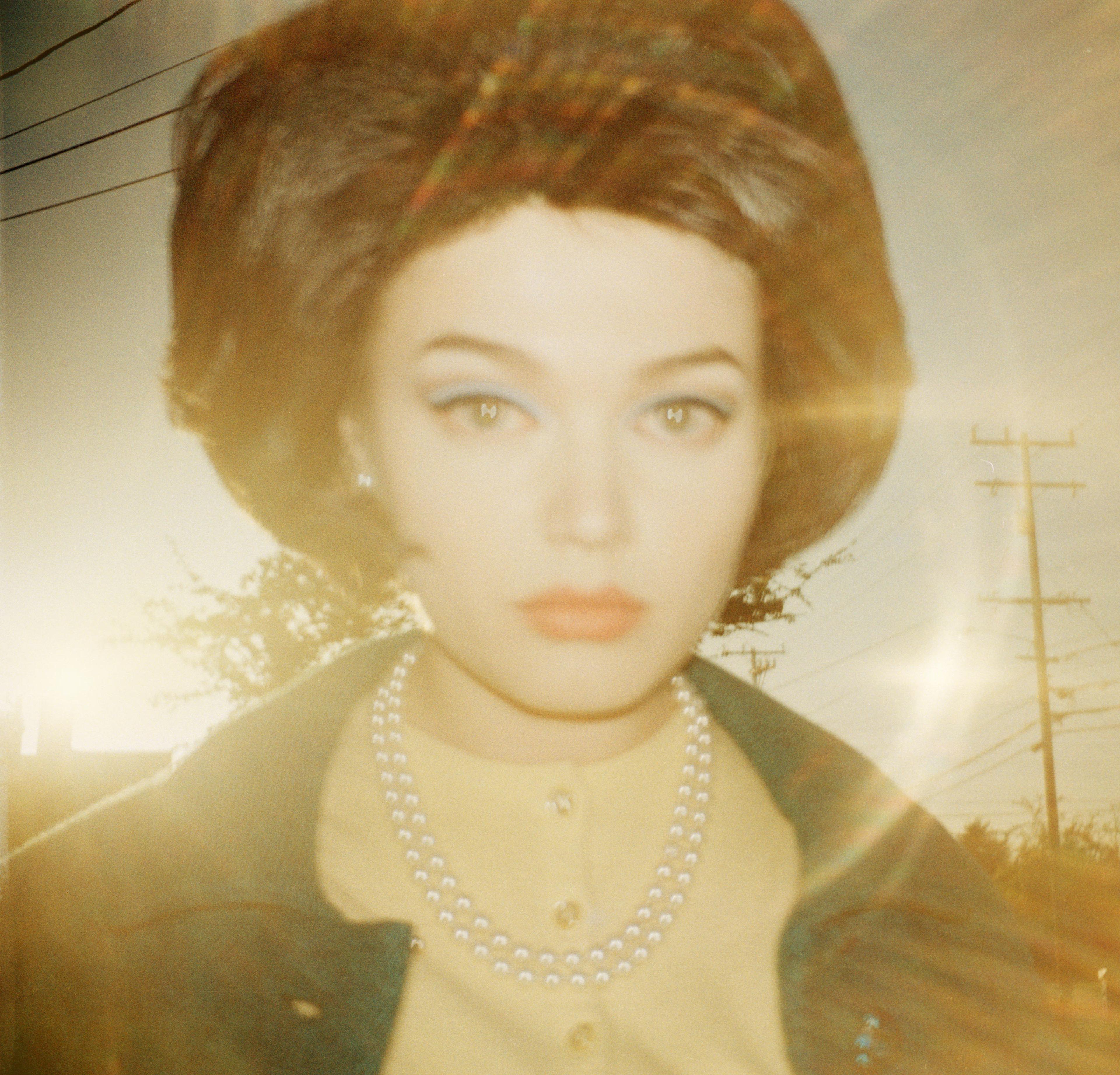 Todd Hido shot this portrait using an original Kodak 126 Film Instamatic analog camera, whose shots compose entirely the photographer's Instagram feed.
