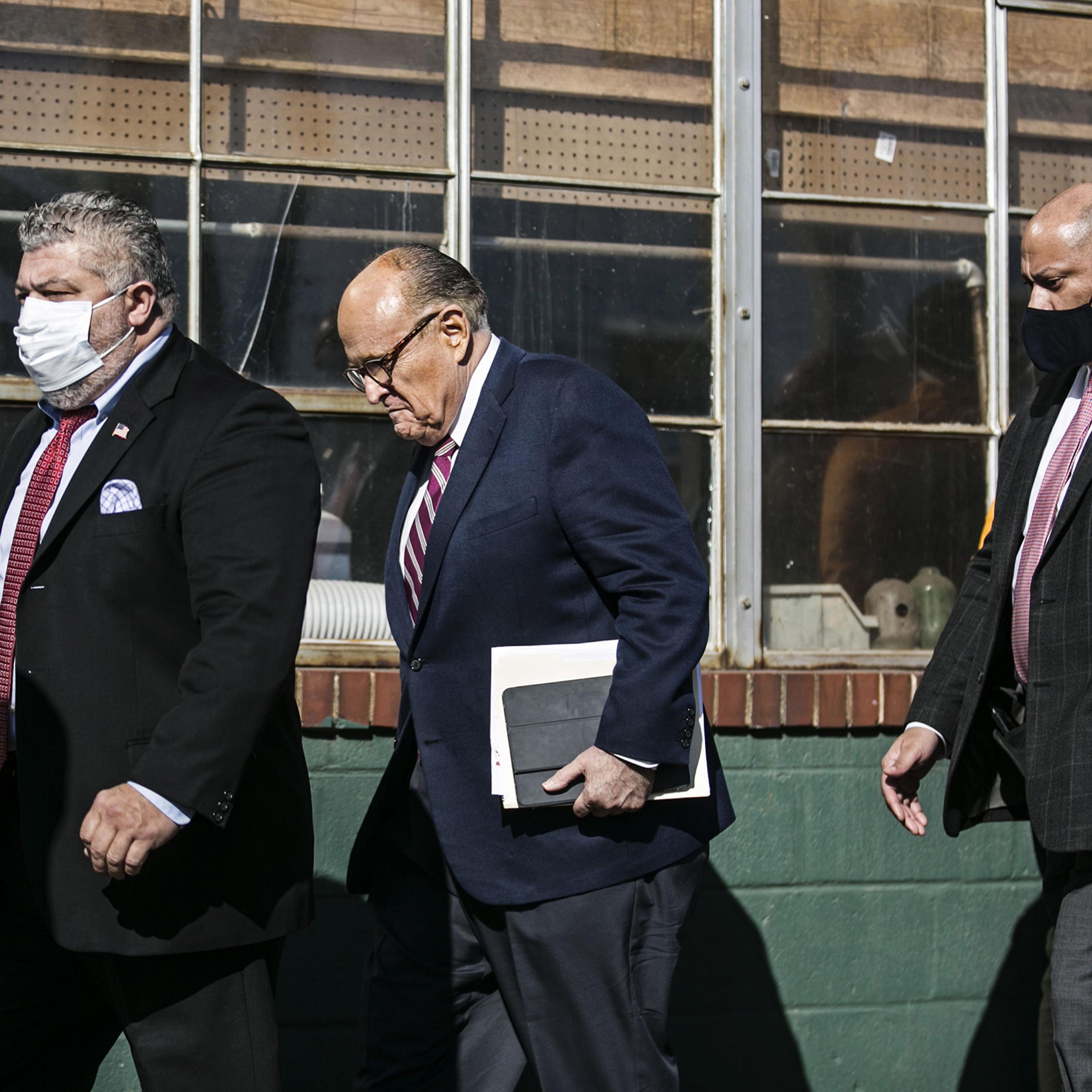 Rudy Giuliani arrives to a news conference in the parking lot of Four Seasons Total Landscaping in Philadelphia, on Nov. 7.