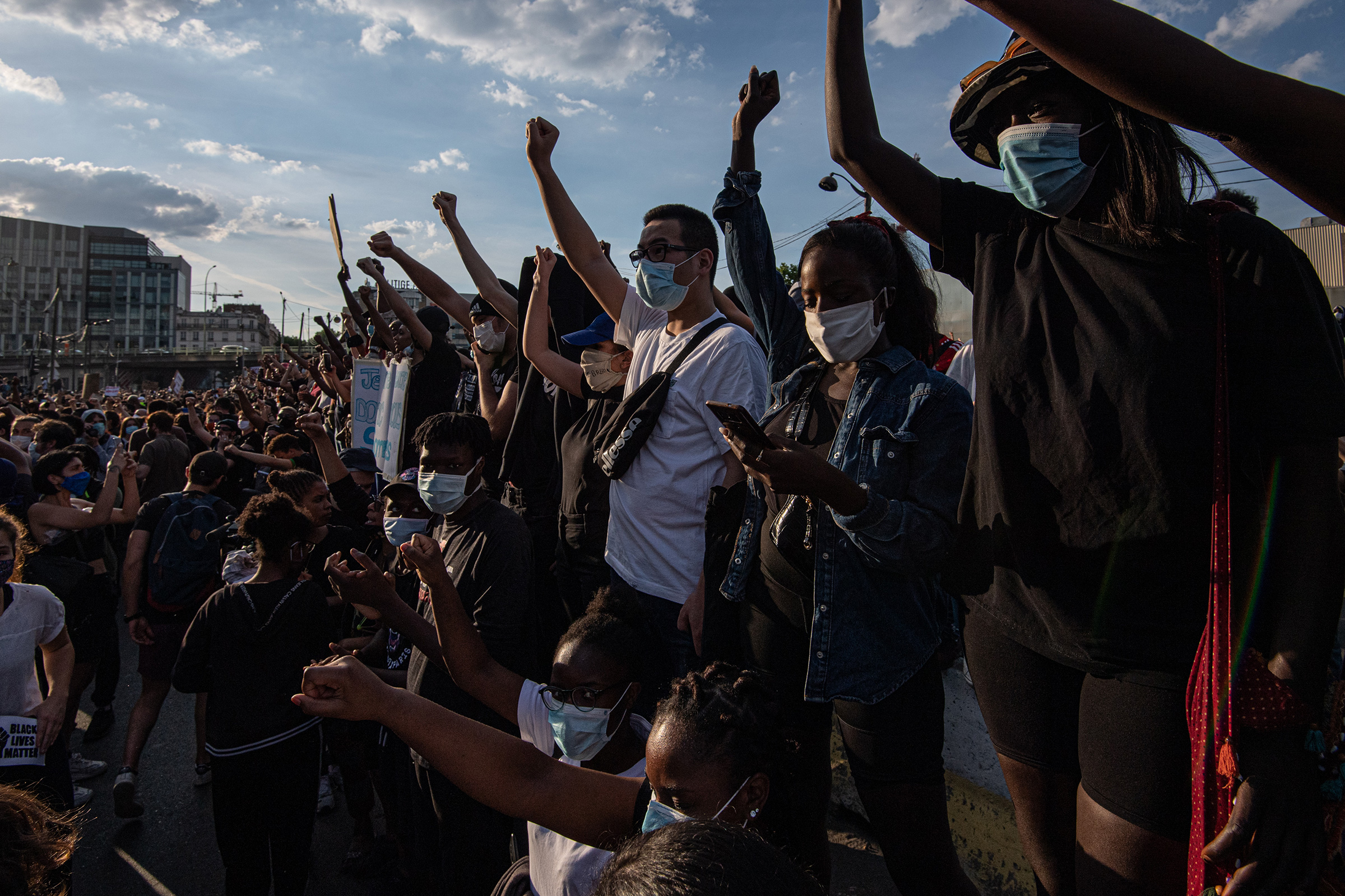 Demonstrators protest against police brutality at the "Tribunal de Paris" courthouse on June 2 in Paris. Thousands of people gathered to protest against racism and police brutality despite a police order that the protest not proceed due to coronavirus (COVID-19) restrictions. 