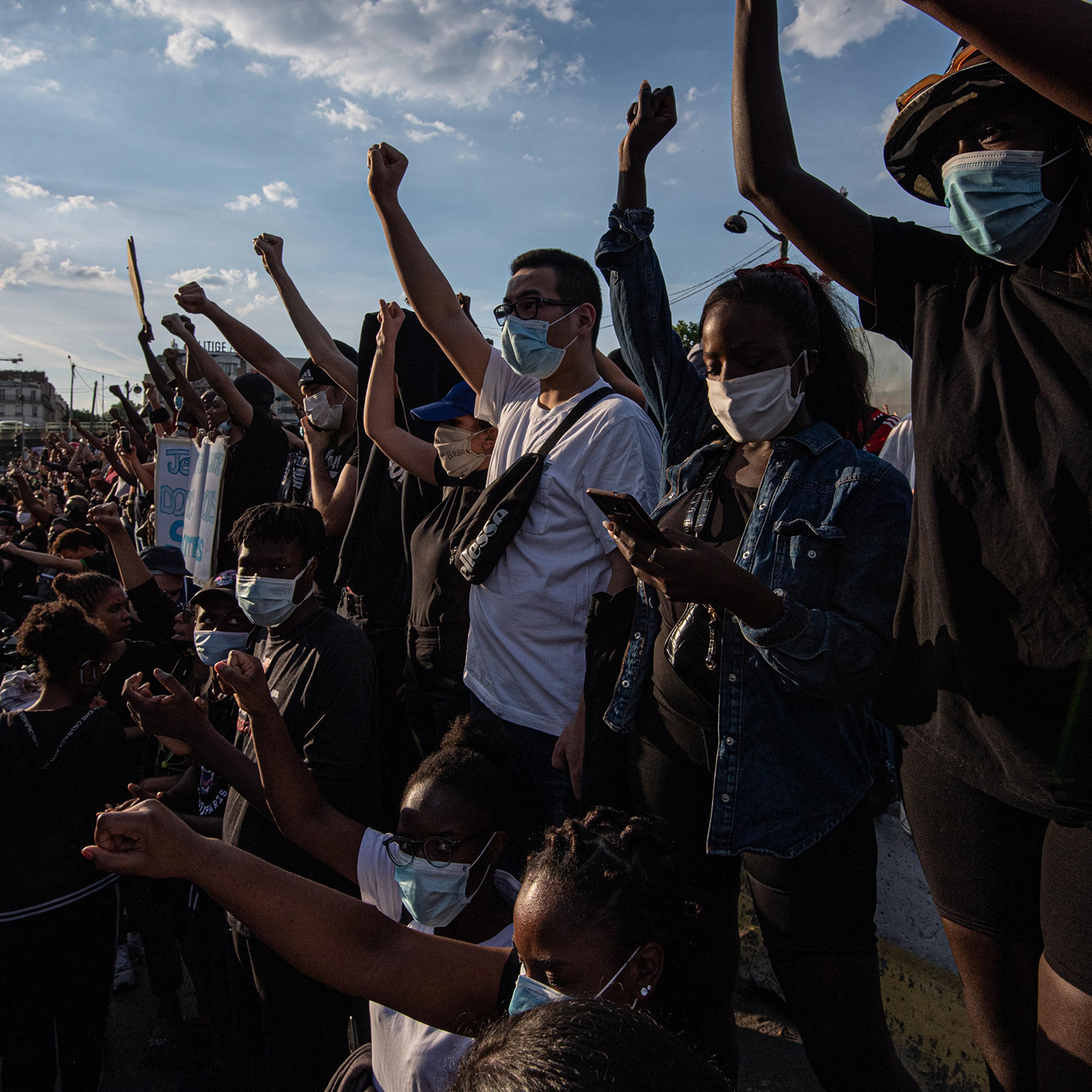 Demonstrators protest against police brutality at the "Tribunal de Paris" courthouse on June 2 in Paris. Thousands of people gathered to protest against racism and police brutality despite a police order that the protest not proceed due to coronavirus (COVID-19) restrictions.