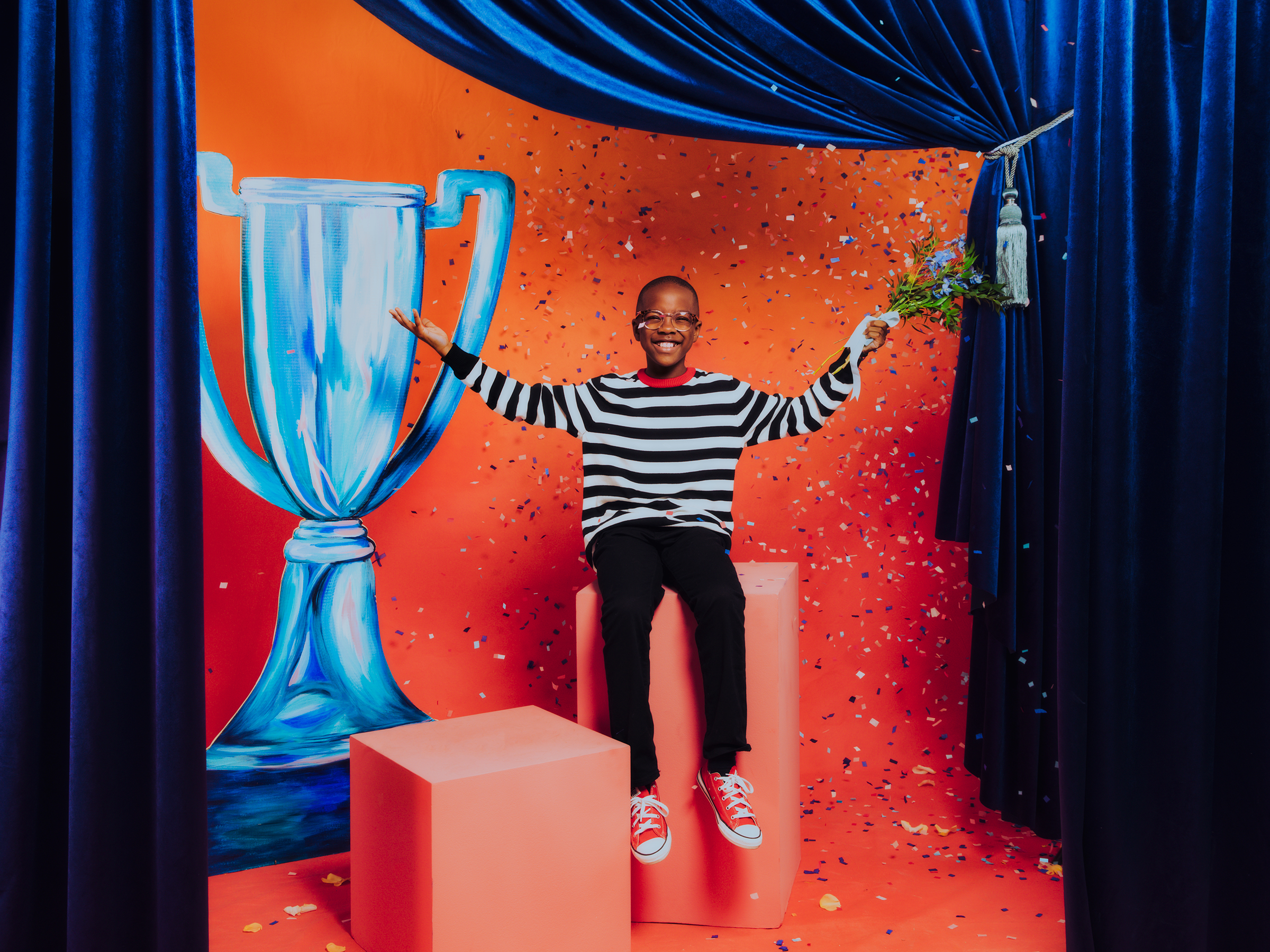 Confetti falls as Orion Jean is photographed in a studio on December 16, 2021.