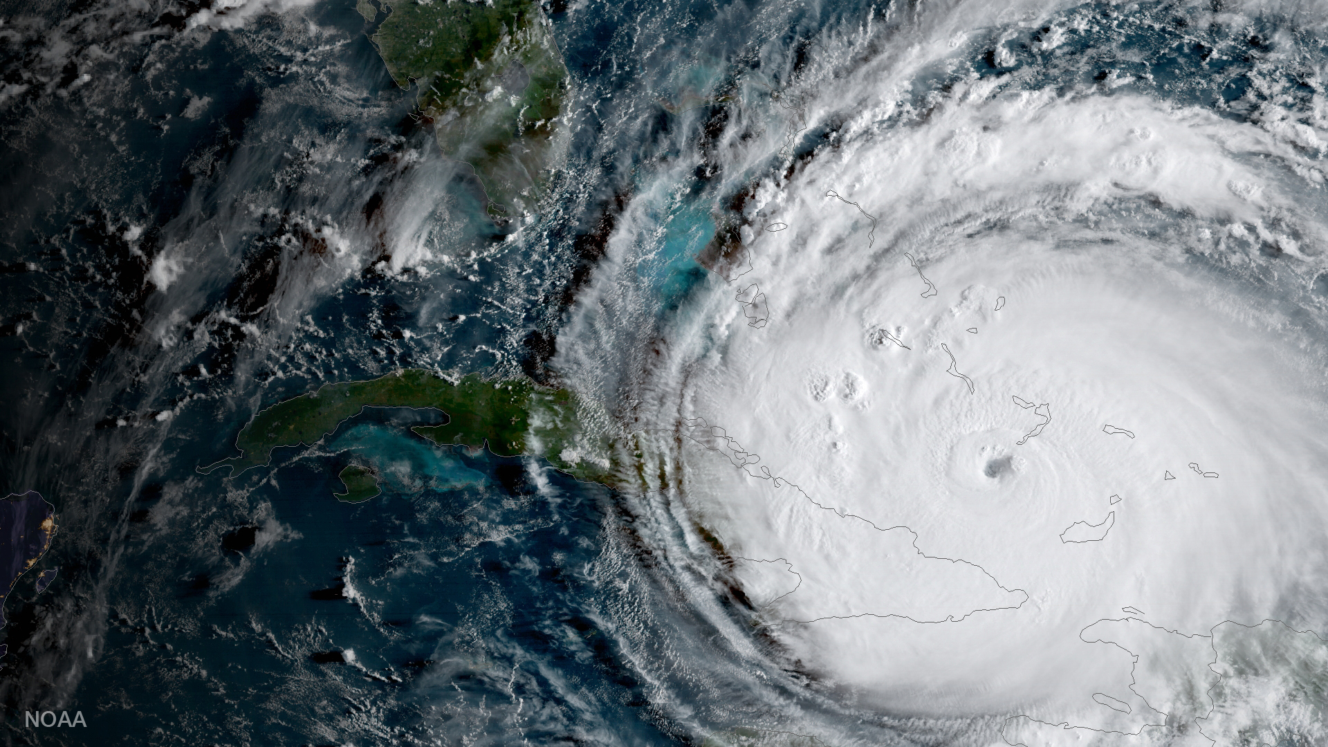 Trouble brewing: A satellite image shows Hurricane Irma passing the eastern end of Cuba at about 8:00 am EST on September 8, 2017.