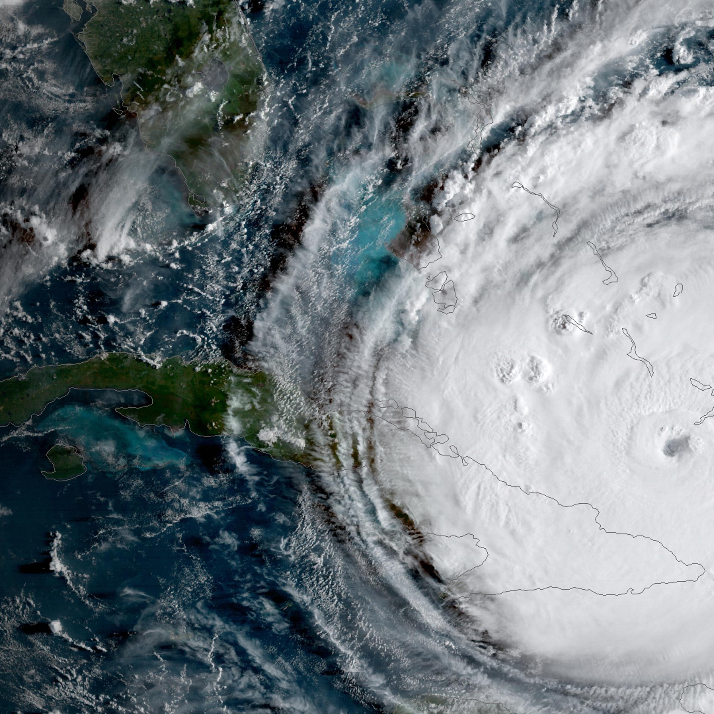 Trouble brewing: A satellite image shows Hurricane Irma passing the eastern end of Cuba at about 8:00 am EST on September 8, 2017.