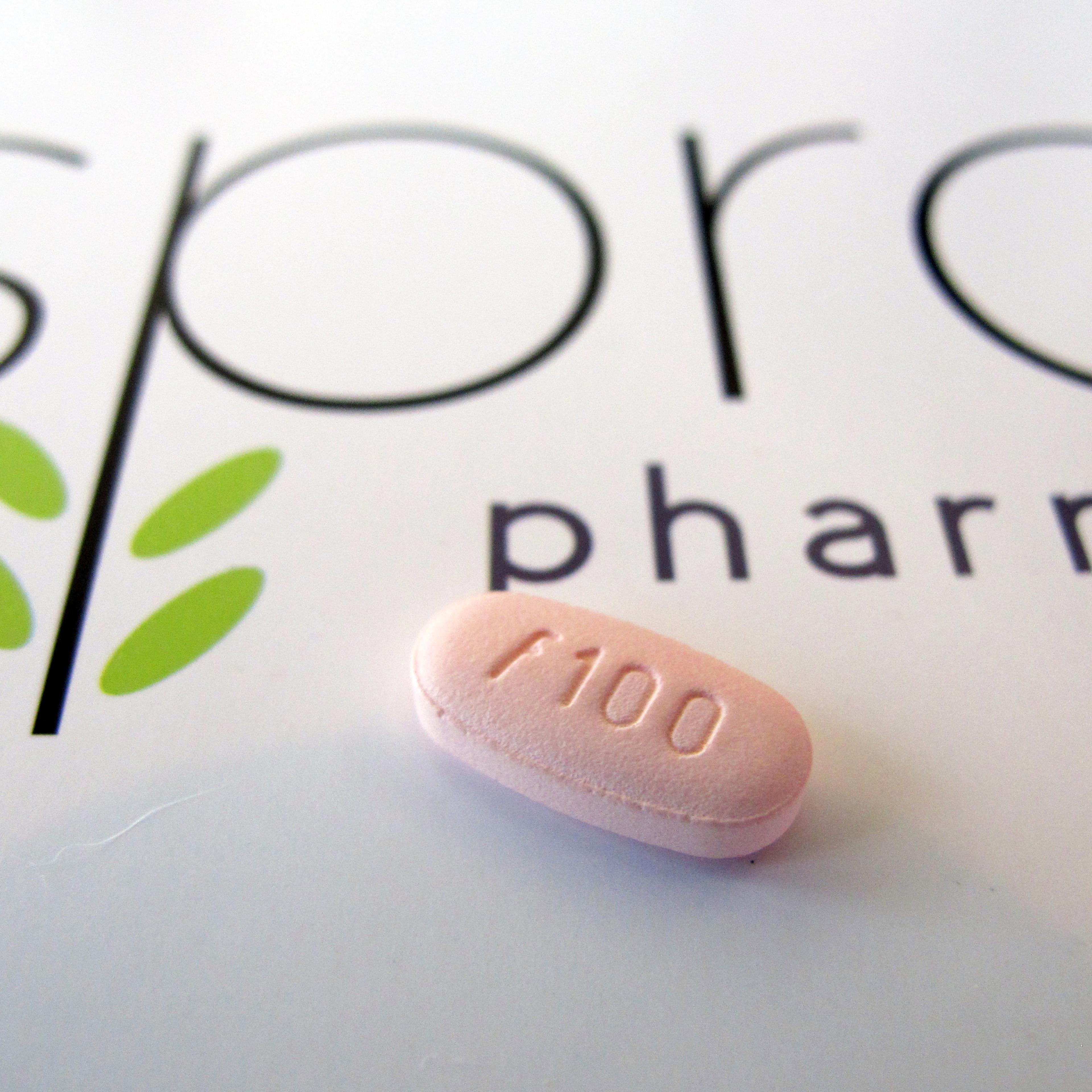 A tablet of flibanserin sits on a brochure for Sprout Pharmaceuticals in the company's Raleigh, N.C., headquarters on June 22, 2015.