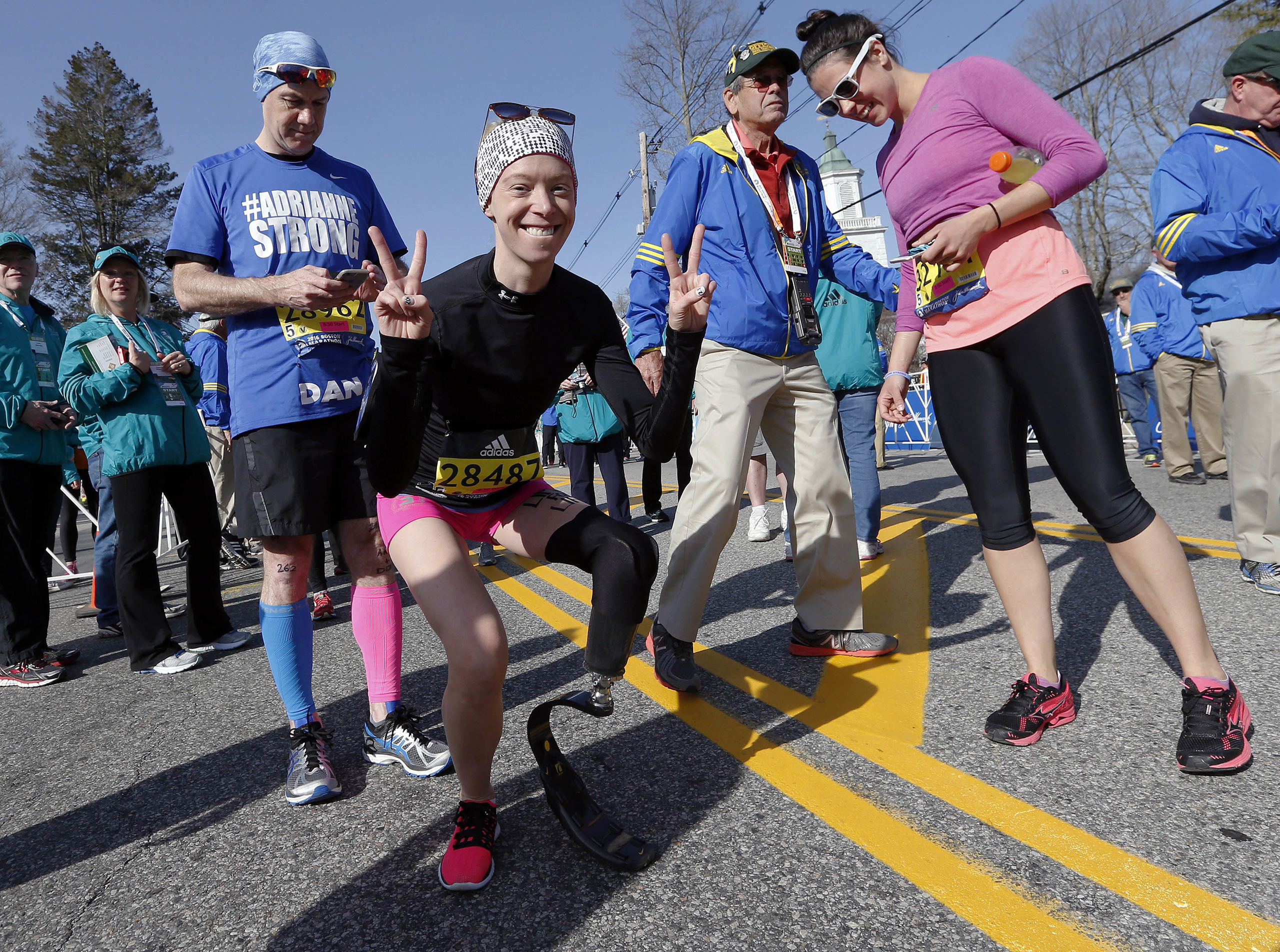Boston Marathon bombing survivor Adrianne Haslet poses before running in the 120th Boston Marathon in Hopkinton, Mass., April 18, 2016.