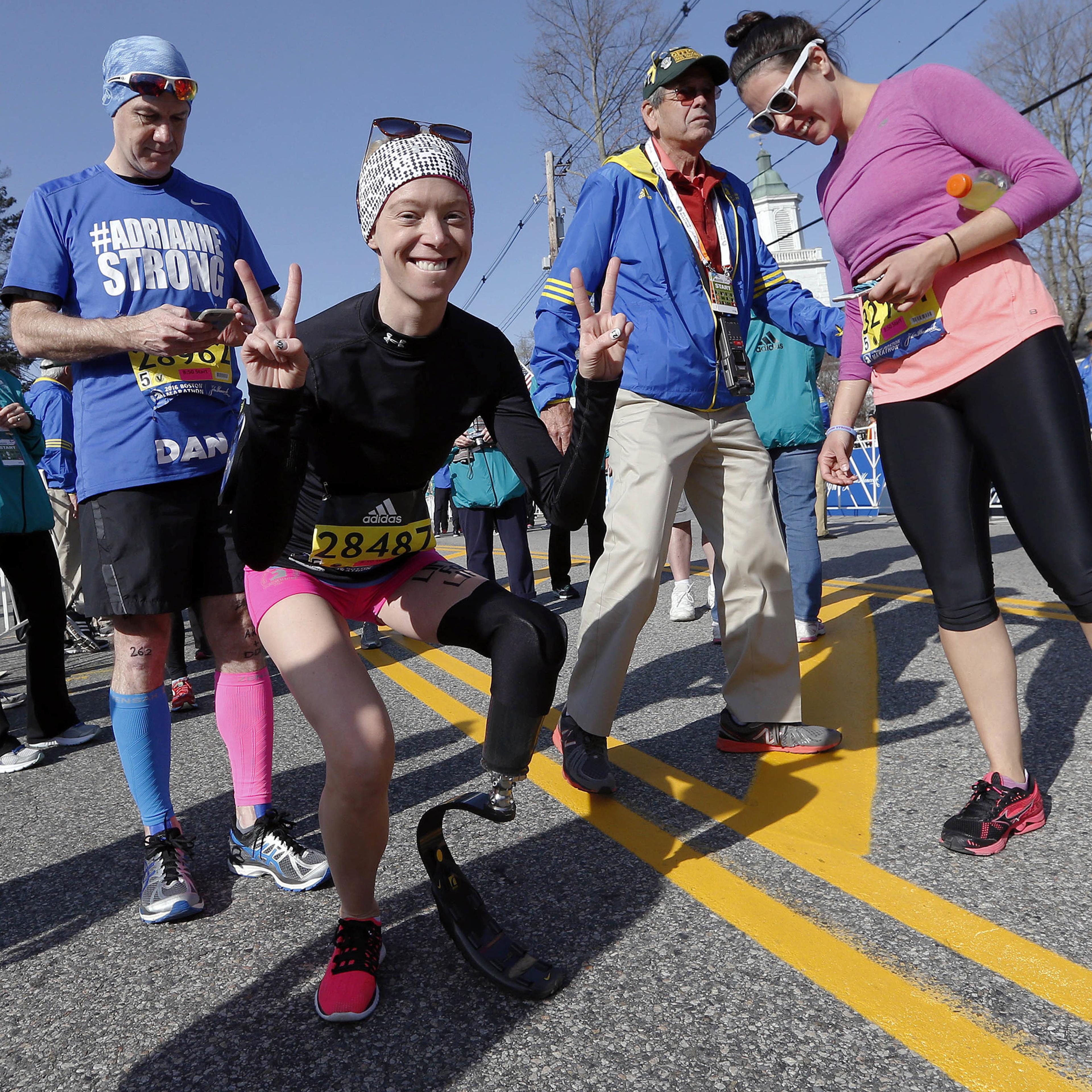 Boston Marathon bombing survivor Adrianne Haslet poses before running in the 120th Boston Marathon in Hopkinton, Mass., April 18, 2016.