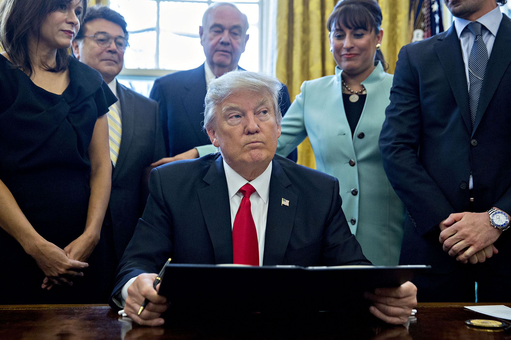 President Trump Signs Executive Order In Oval Office Of The White House