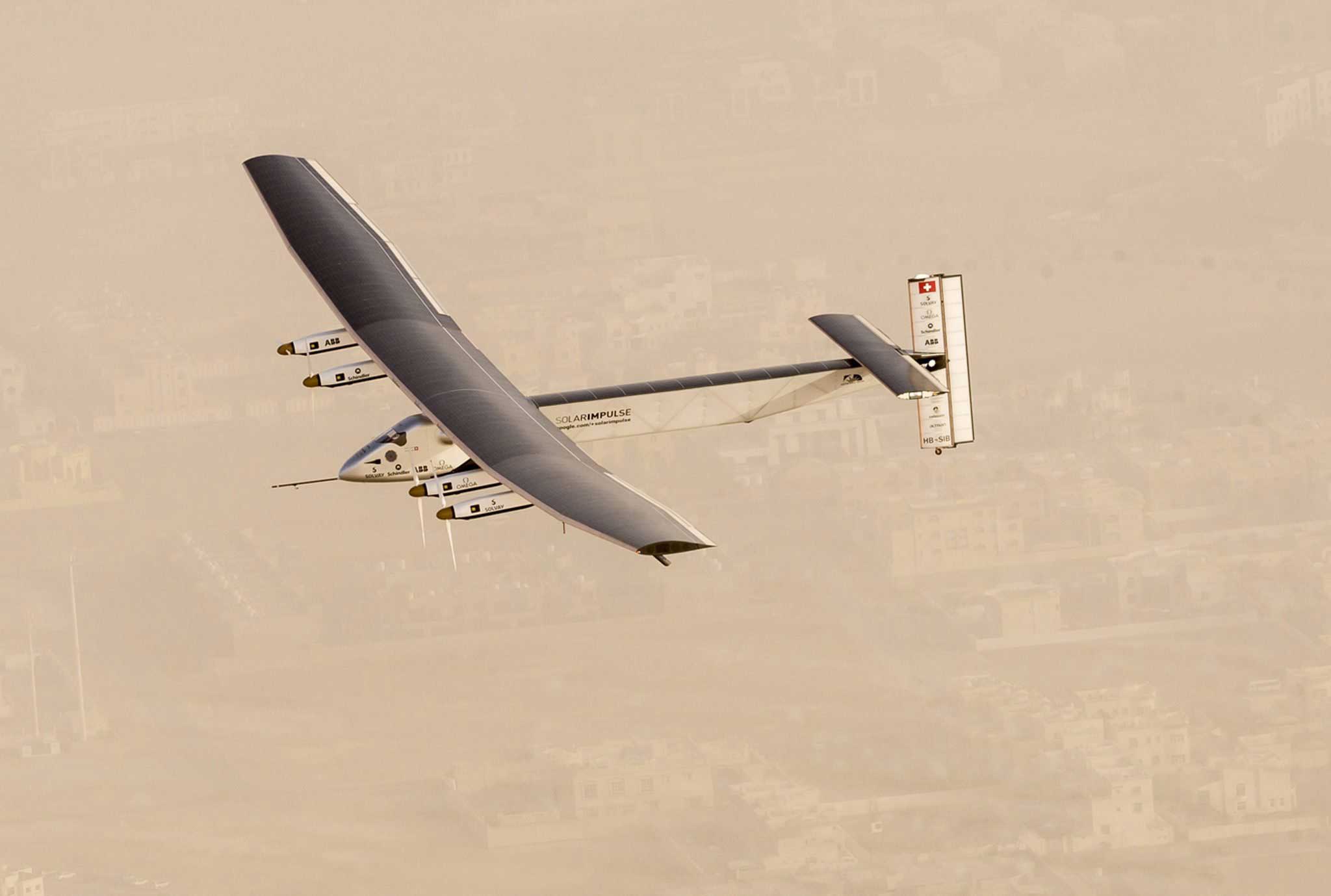 Solar Impulse 2, a solar-powered airplane, takes flight as it begins its historic round-the-world journey from Al Bateen Airport in Abu Dhabi on March 9, 2015.