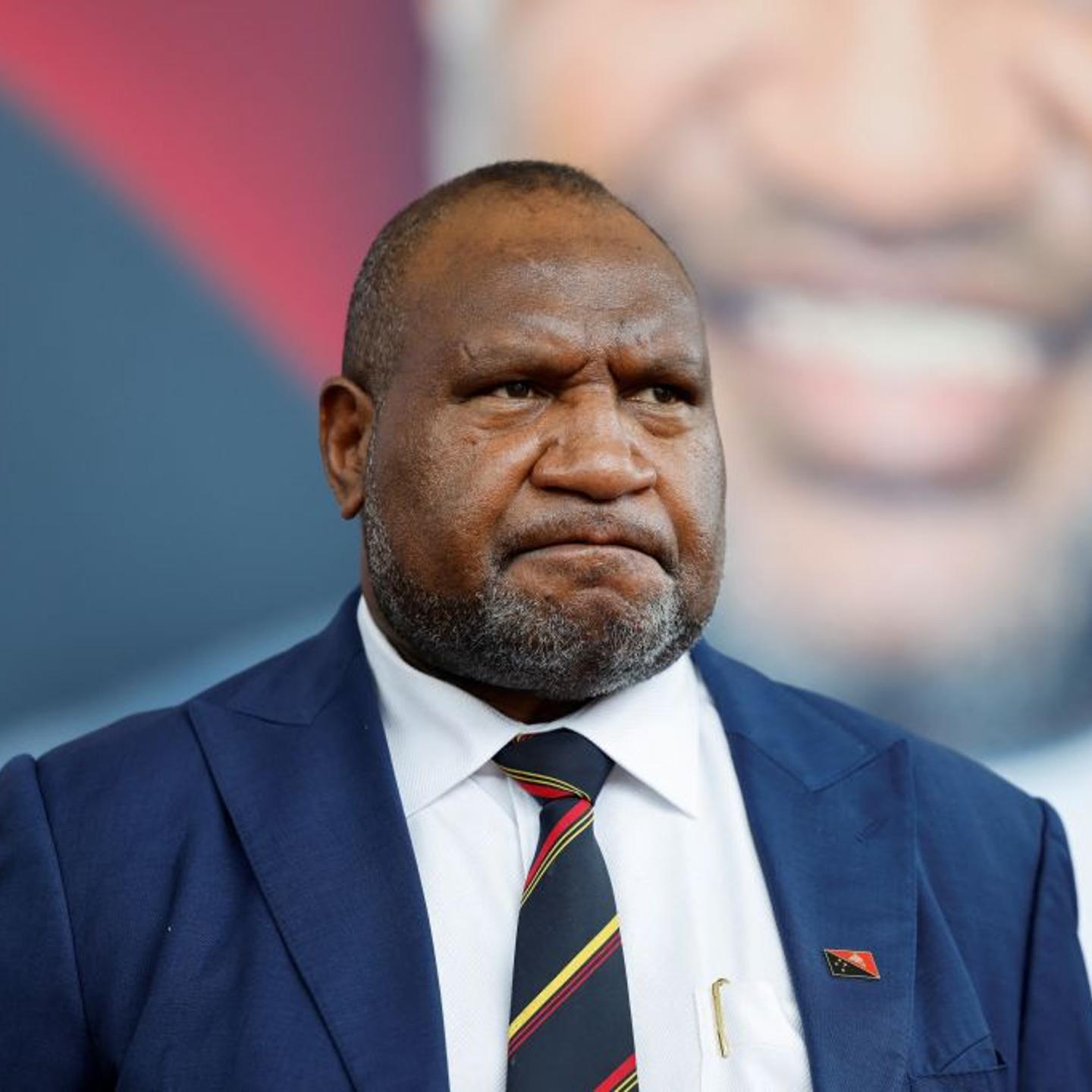 Papua New Guiney Prime Minister James Marape waits for French President Emmanuel Macron at APEC haus in Port Moresby on July 28, 2023.