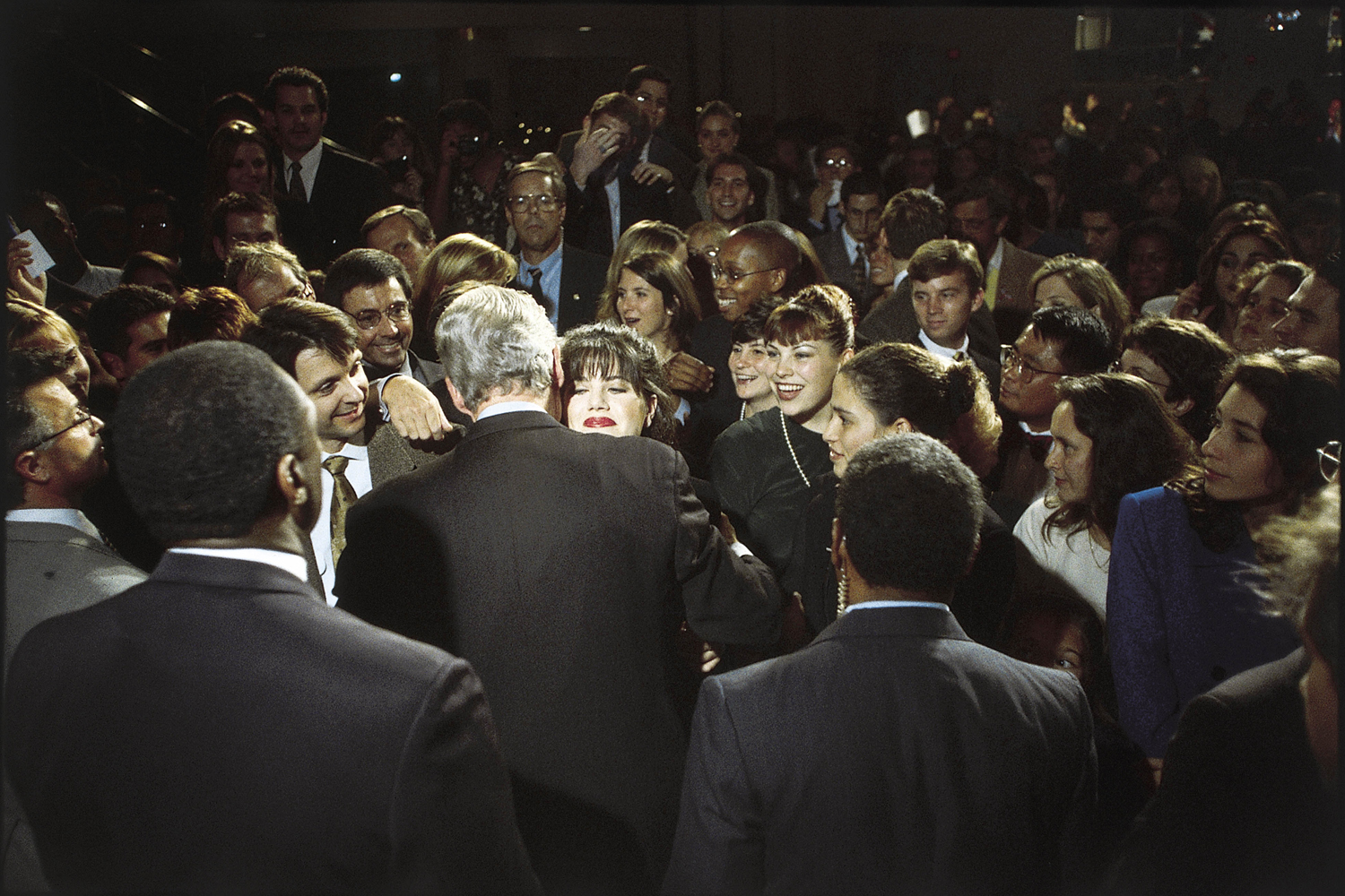 Former White House intern Monica Lewinsky embraces President Bill Clinton at a Democratic fundraiser in Washington, D.C., Oct. 23, 1996.