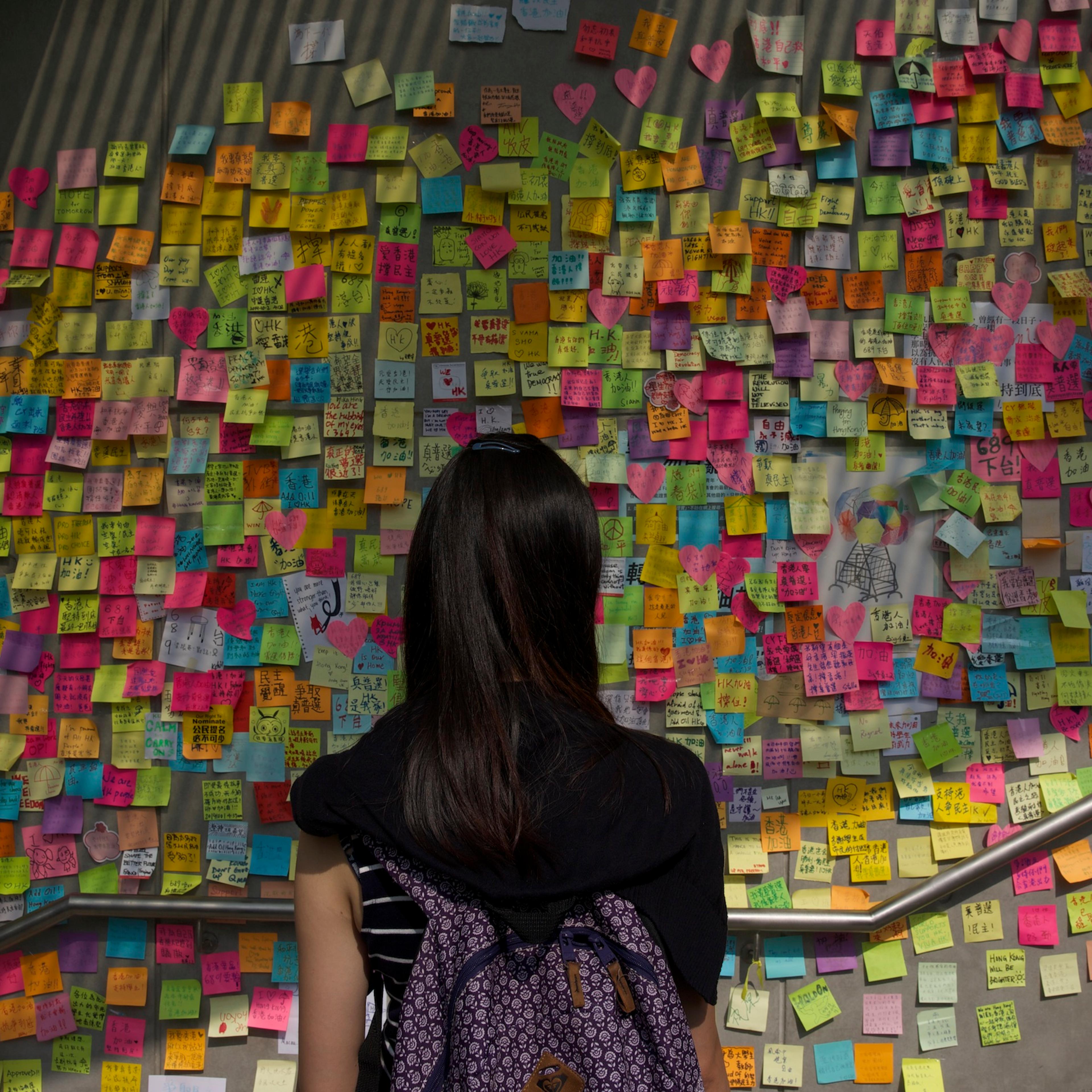 Democracy demonstrations in Hong Kong. Students and pro-democracy citizens being attacked and shouted at by anti-demonstration group in Mongkok. Pro-police rally. Joshua Wong, 17-year-old protest leader.by James Nachtwey