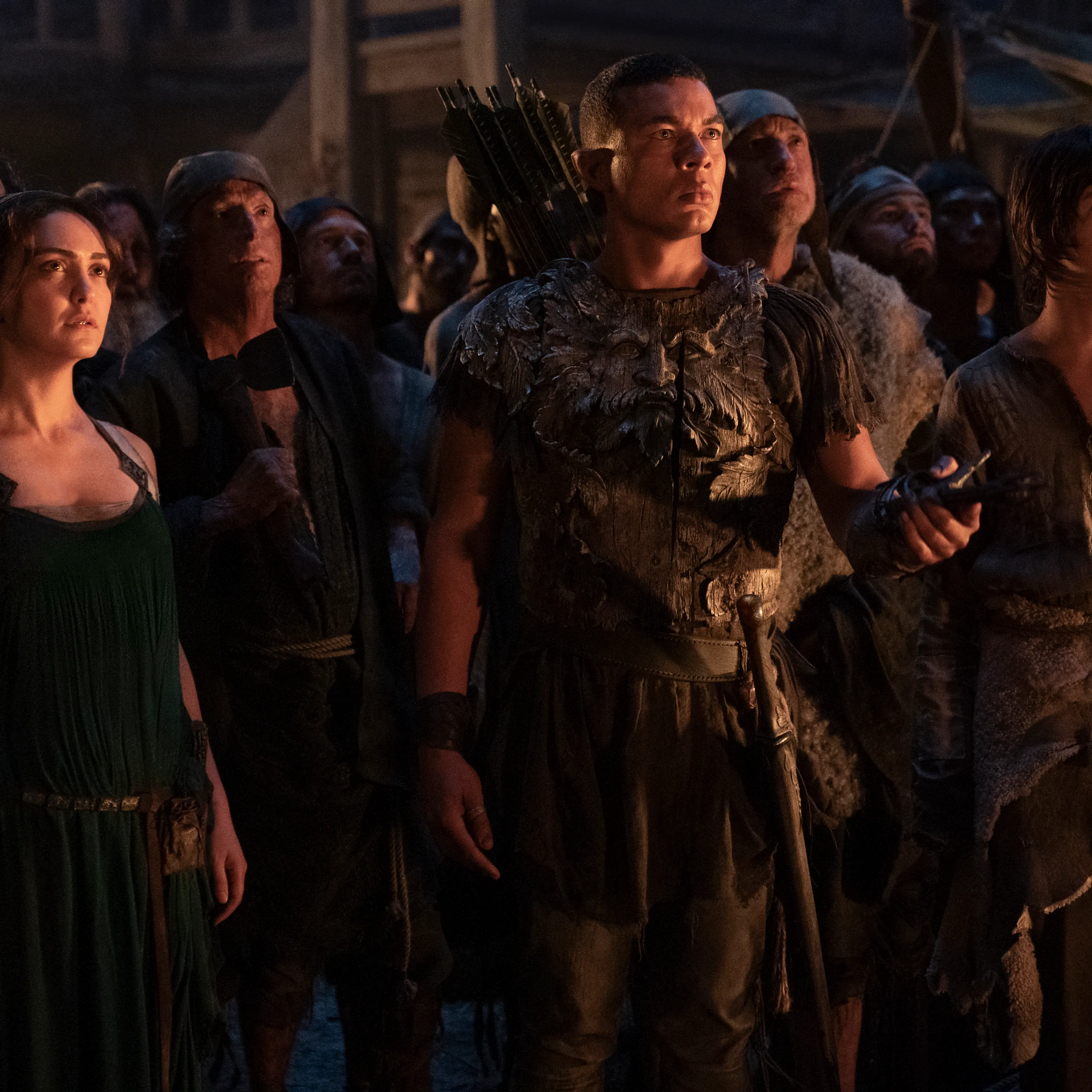(L-R) Nazanin Boniadi as Bronwyn, Ismael Cruz Córdova as Arondir, and Tyroe Muhafidin as Theo in <i>The Rings of Power</i>