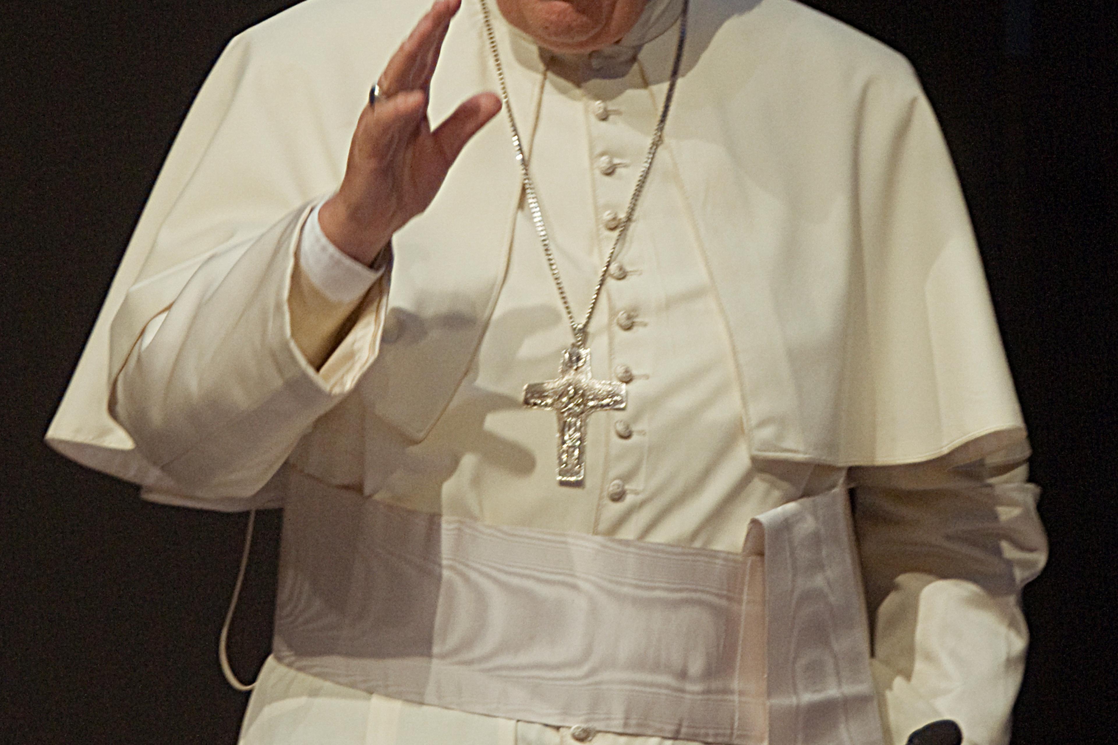 Pope Francis greets the attendees of a conference as part of the II Meeting of People's Movements in Santa Cruz, Bolivia, on on July 9, 2015.