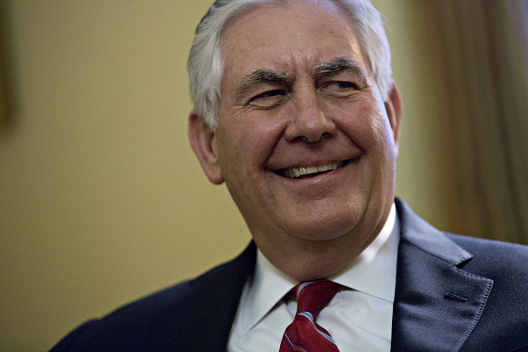 Rex Tillerson, former chief executive officer of Exxon Mobil Corp. and U.S. secretary of state nominee for president-elect Donald Trump, smiles during a meeting with Senate Majority Leader Mitch McConnell, a Republican from Kentucky, not pictured, on Cap