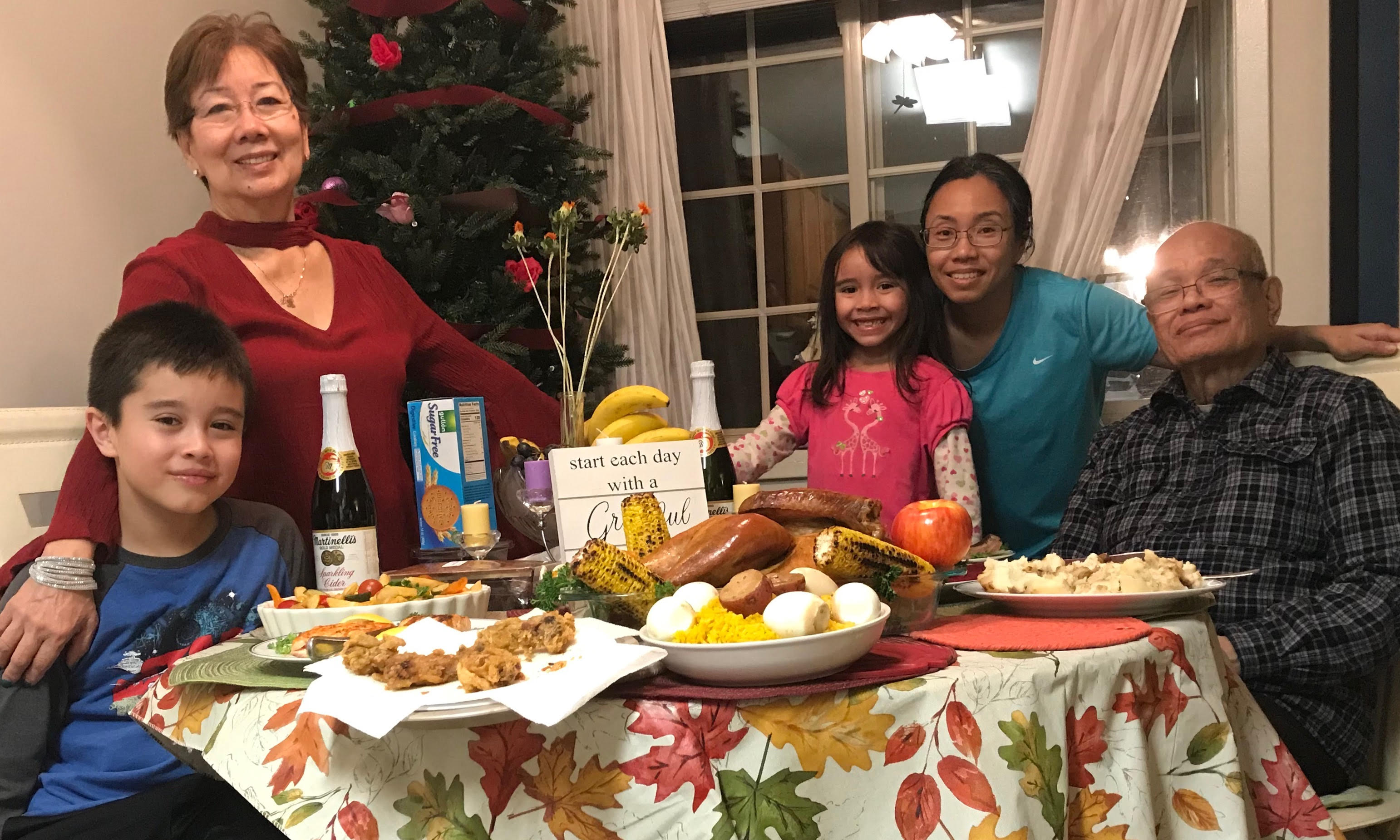 Barbara Zeman (center), with her dad Agustin Gomez, mother Malda Gomez, and her two children, John and Kylie.
