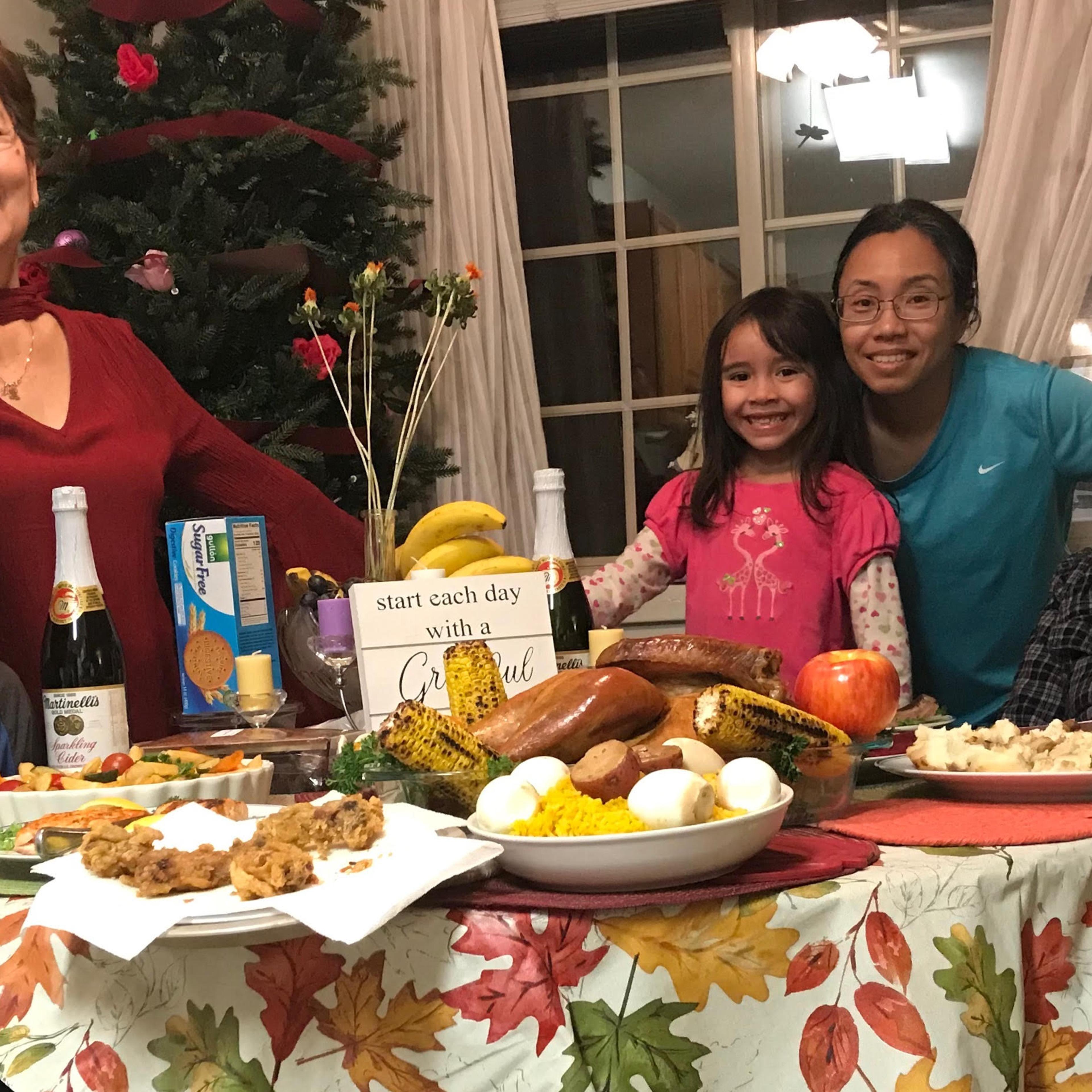 Barbara Zeman (center), with her dad Agustin Gomez, mother Malda Gomez, and her two children, John and Kylie.