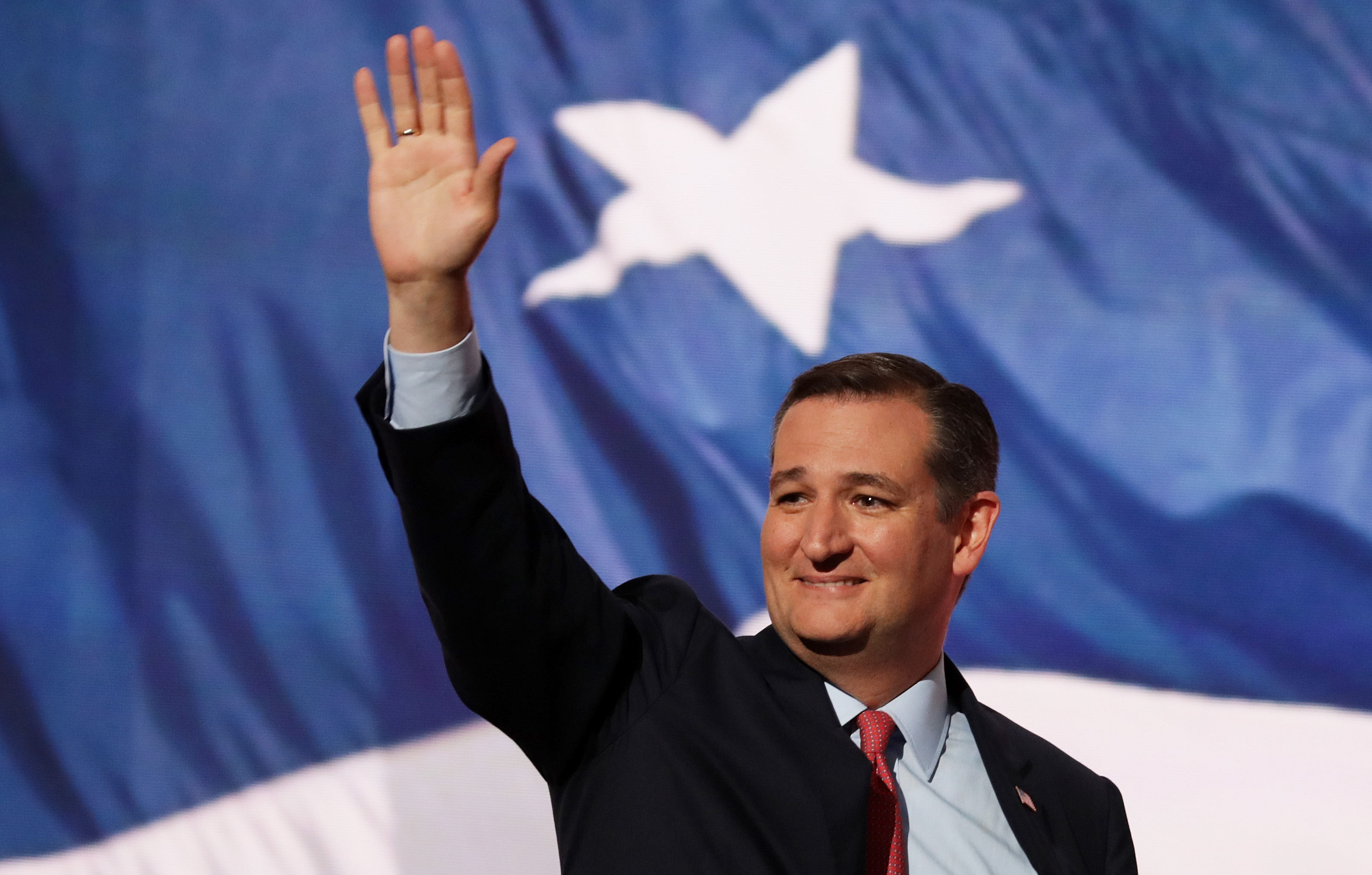 Sen. Ted Cruz (R-TX) waves to the crowd as he walks on stage to deliver a speech on the third day of the Republican National Convention on July 20, 2016 at the Quicken Loans Arena in Cleveland, Ohio.