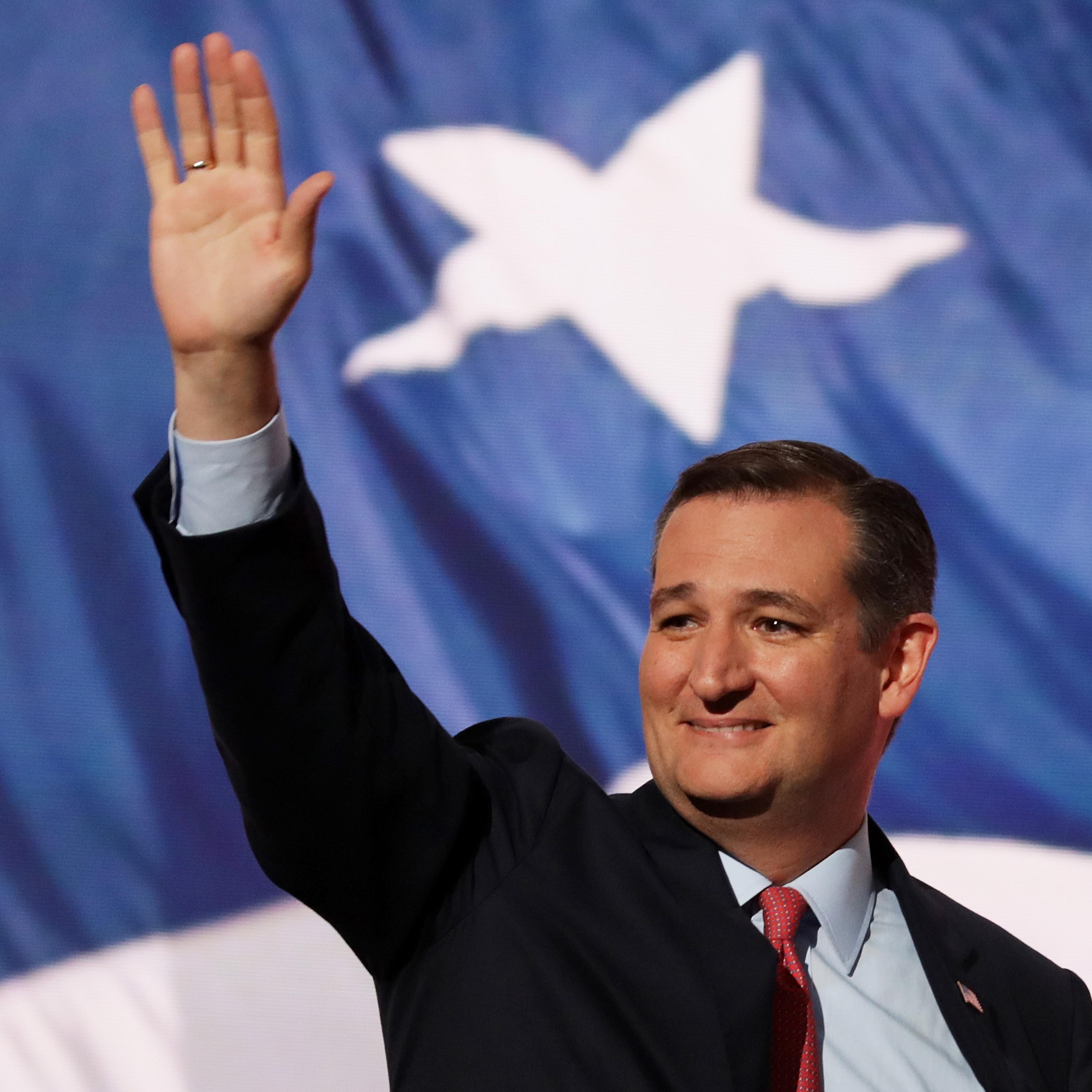 Sen. Ted Cruz (R-TX) waves to the crowd as he walks on stage to deliver a speech on the third day of the Republican National Convention on July 20, 2016 at the Quicken Loans Arena in Cleveland, Ohio.