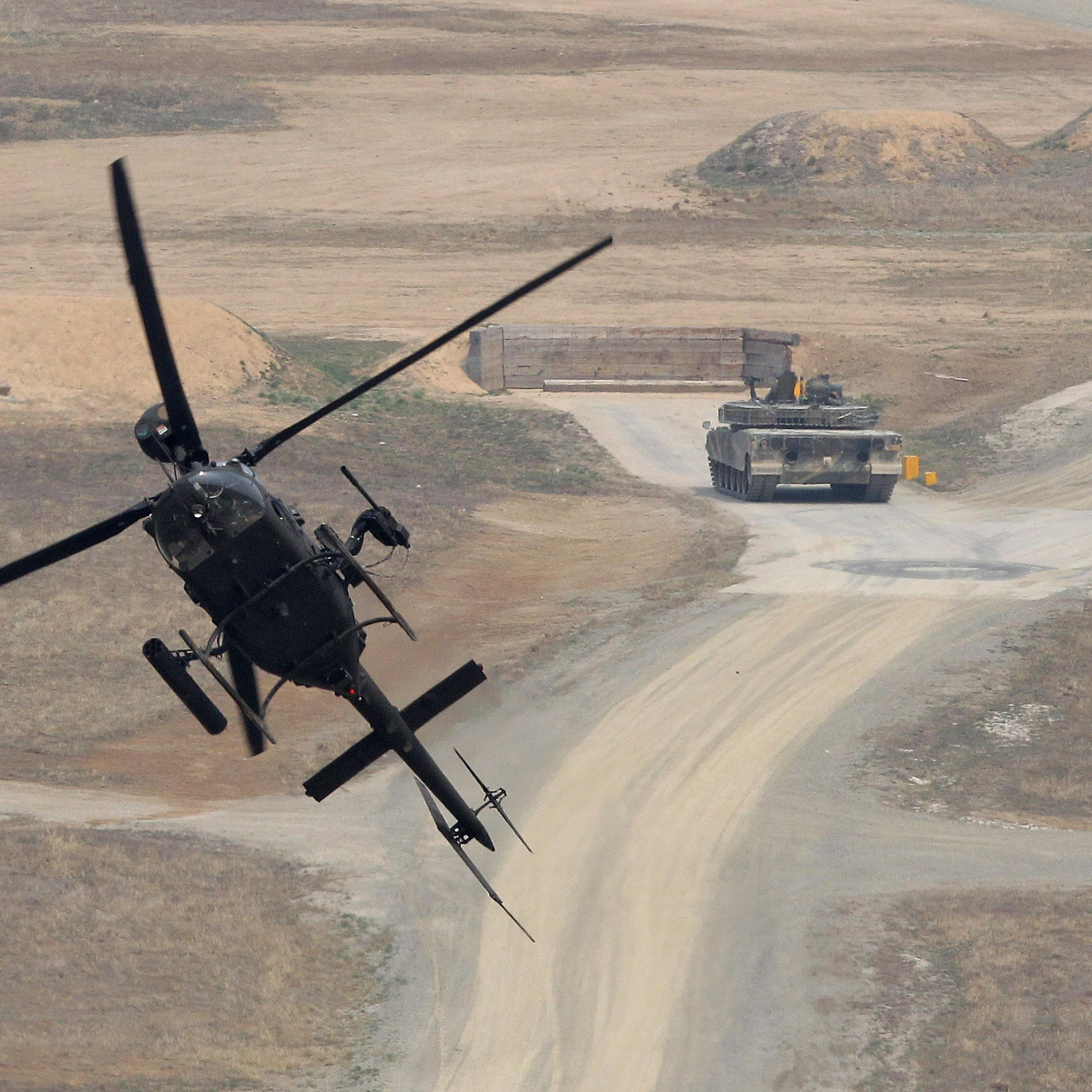 POCHEON, SOUTH KOREA - APRIL 11: A Kiowa Warrior helicopter hover during the United States and South Korean Joint live fire Exercise at Rodriguez Range on April 11, 2014 in Pocheon, South Korea. This is a part of annual joint Combined Forces Command and