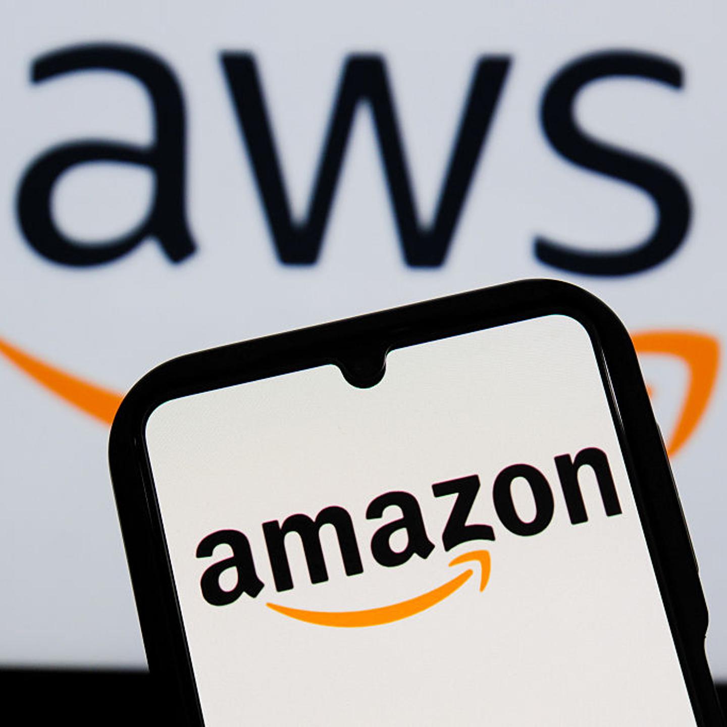 In this photo illustration, an Amazon logo is displayed on a
