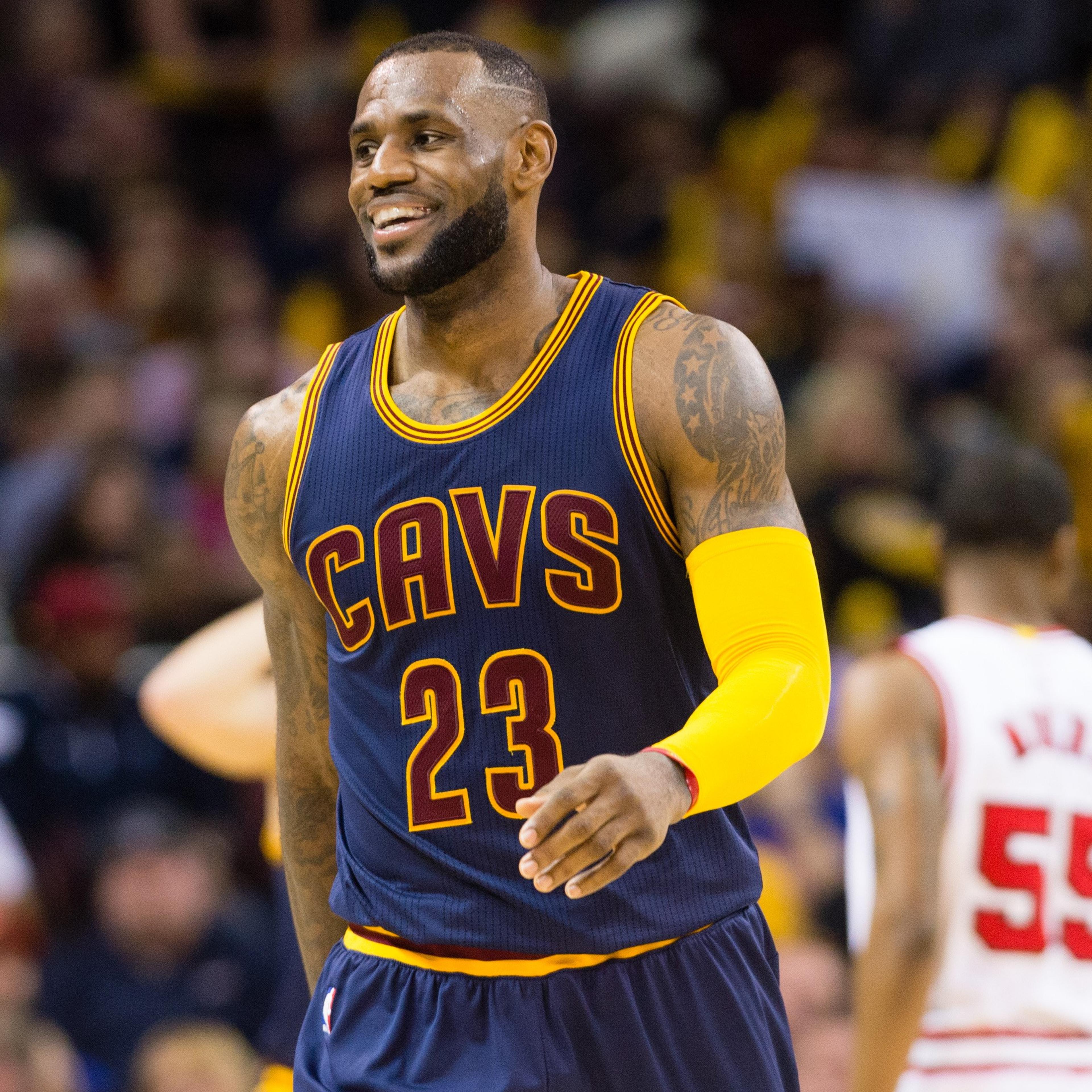 LeBron James of the Cleveland Cavaliers smiles to the fans during the second half against the Chicago Bulls at Quicken Loans Arena on April 5, 2015 in Cleveland.