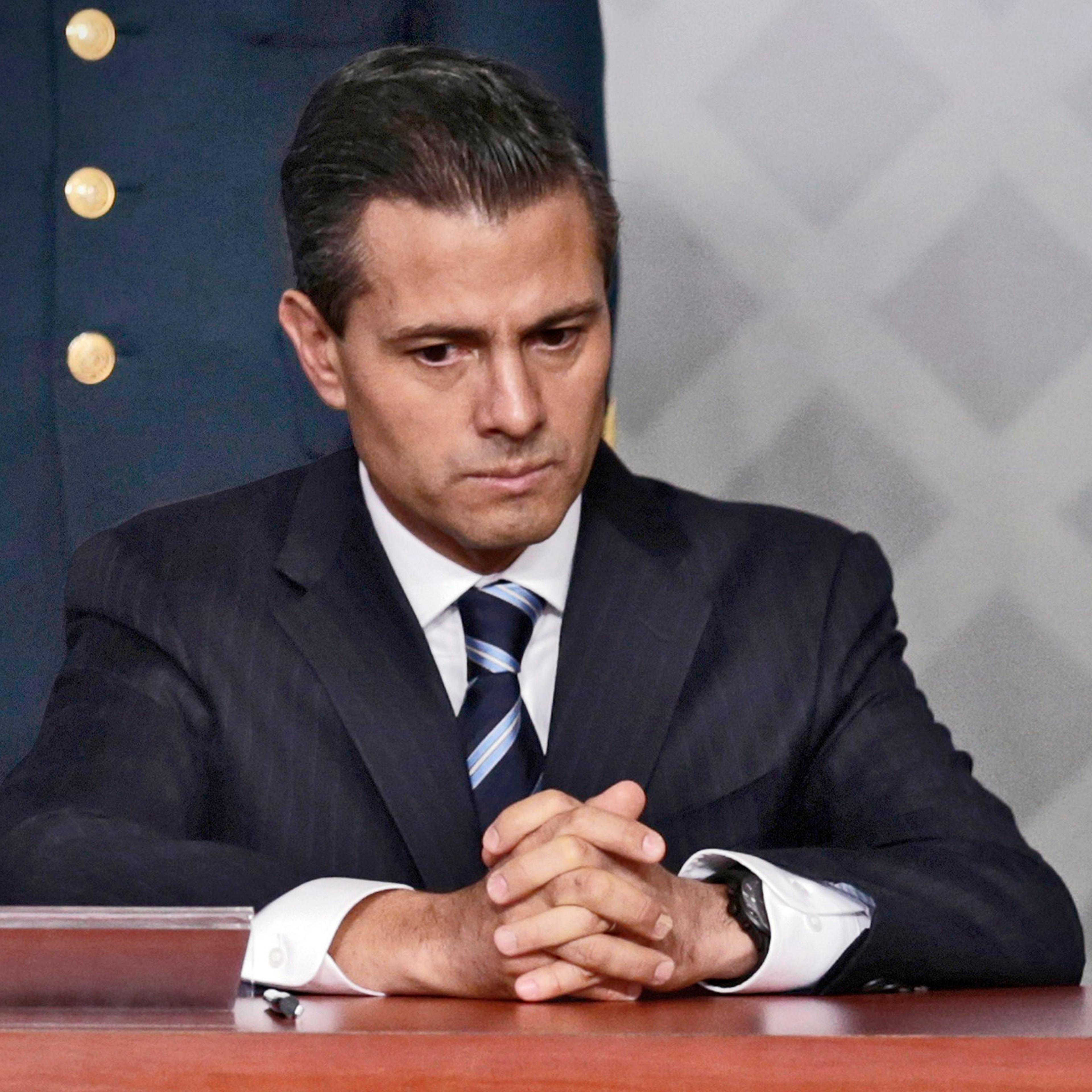 Mexico's President Enrique Pena Nieto sits during a meeting with lawyers in Mexico City