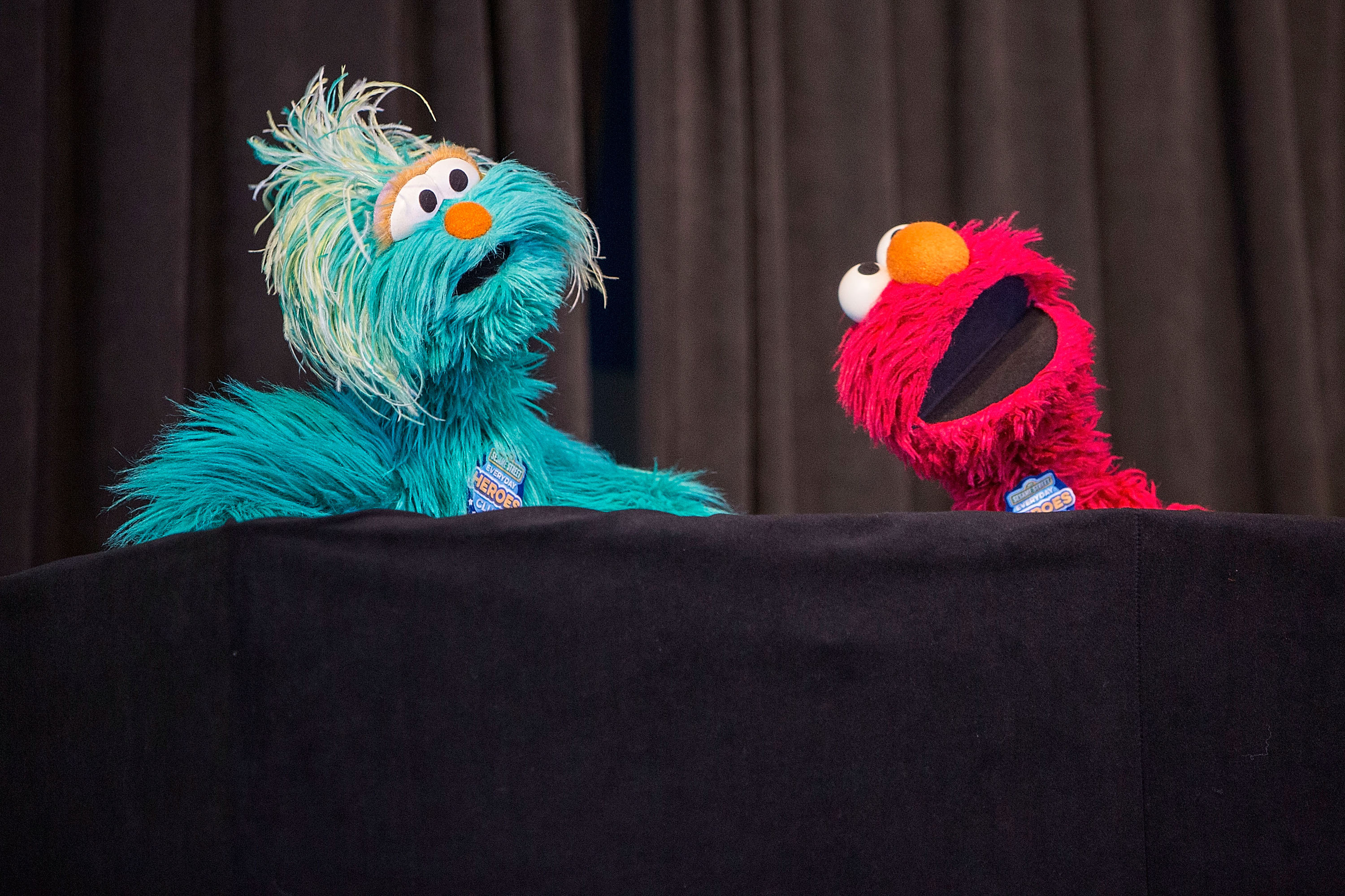 Sesame Street characters Rosita (L) and Elmo perform on stage at Sesame Street and HBO Host Free Museum Day with a special performance by Elmo and Friends at The New Children's Museum on January 9, 2016 in San Diego, California.